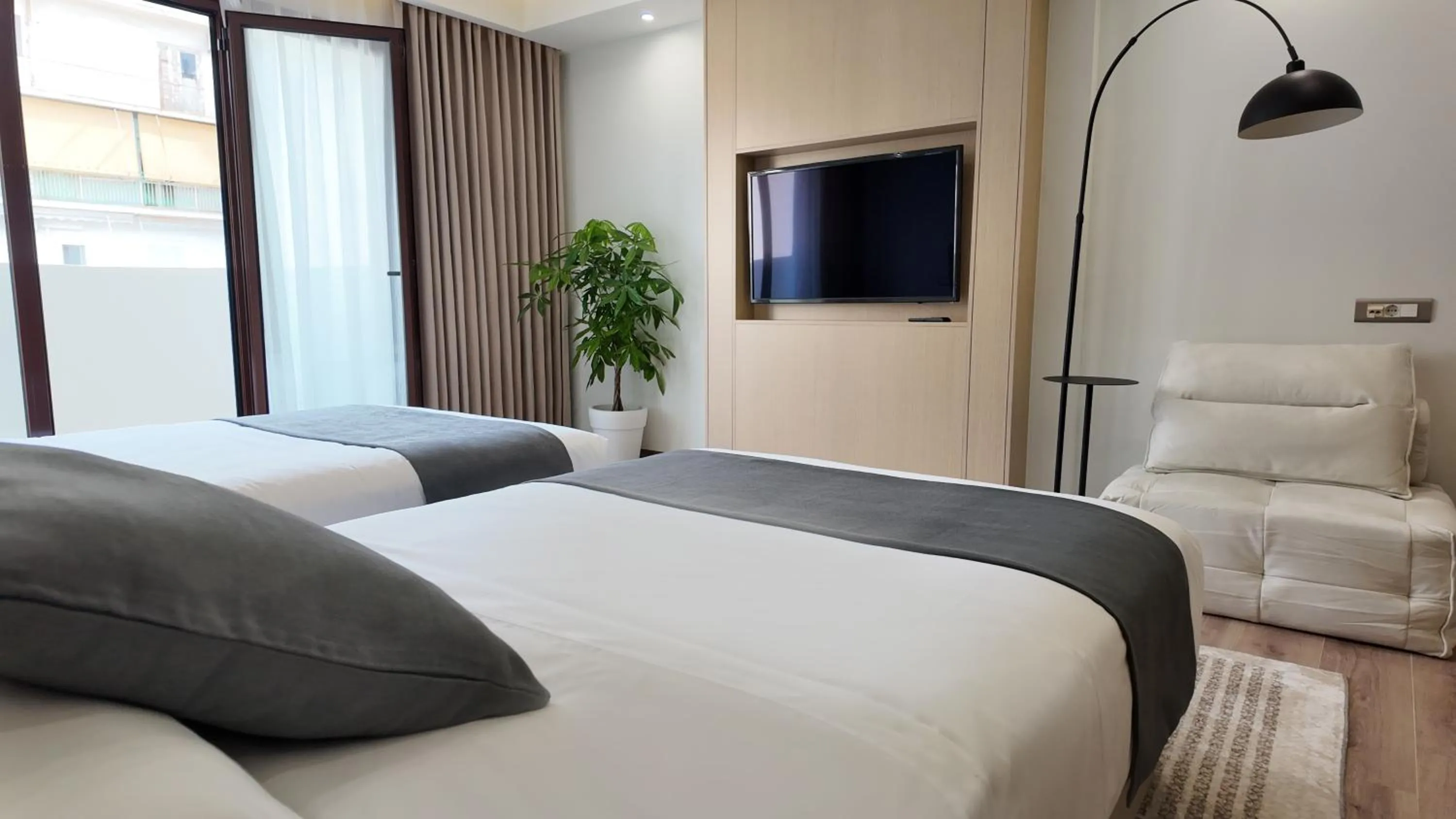 Bed in CC LUX Suites in Piraeus Port