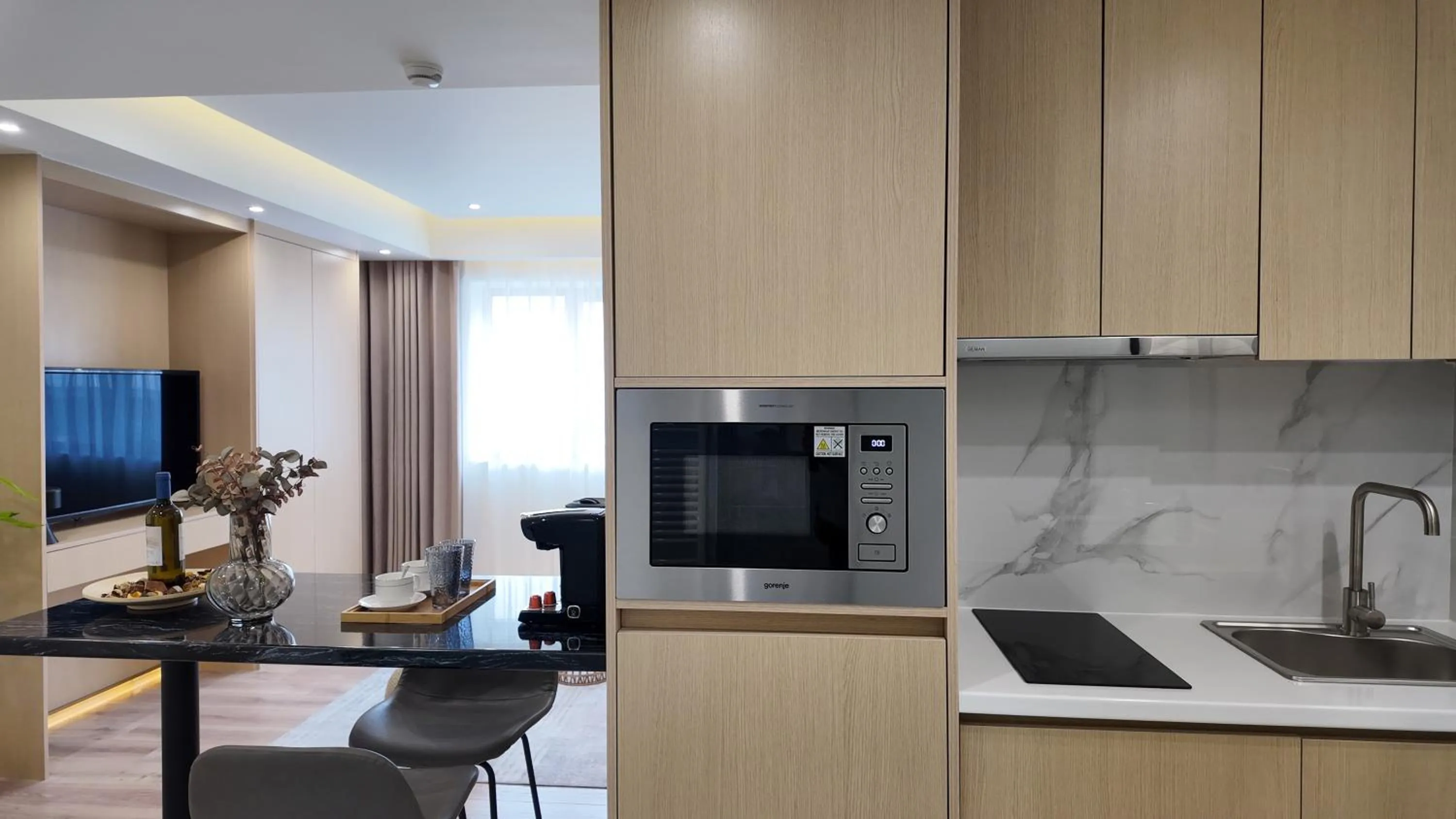 Kitchen or kitchenette in CC LUX Suites in Piraeus Port