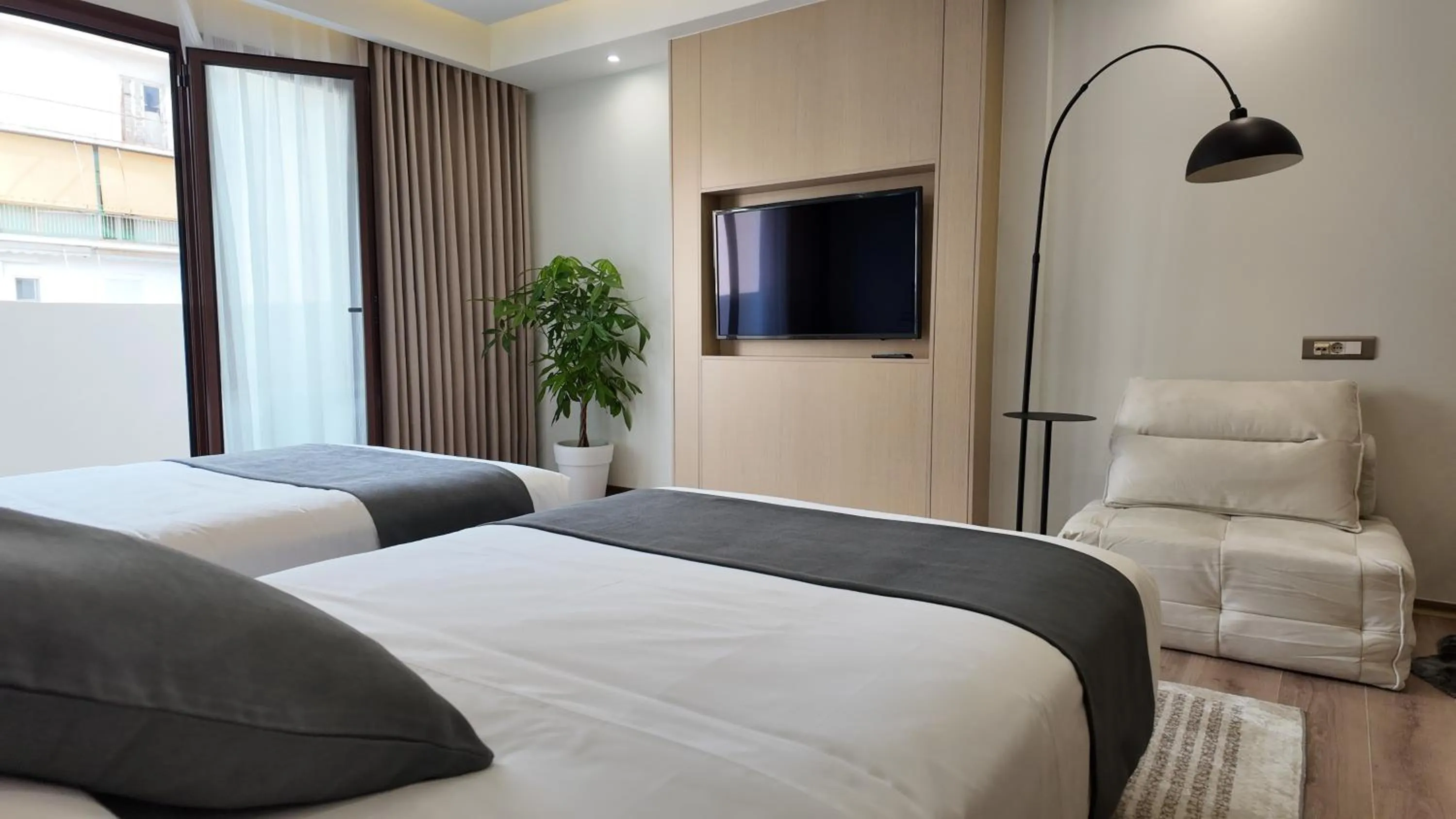 TV and multimedia, Bed in CC LUX Suites in Piraeus Port
