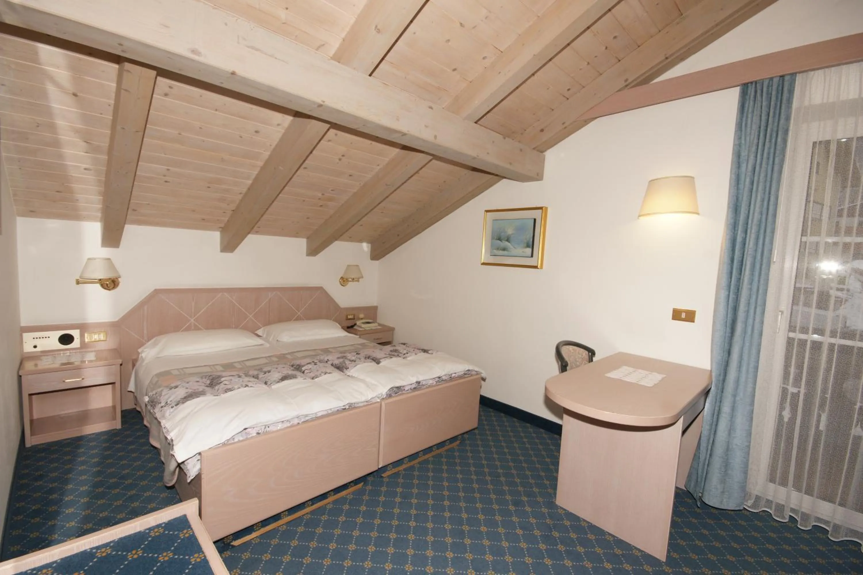 Bed in Hotel Villa Mozart