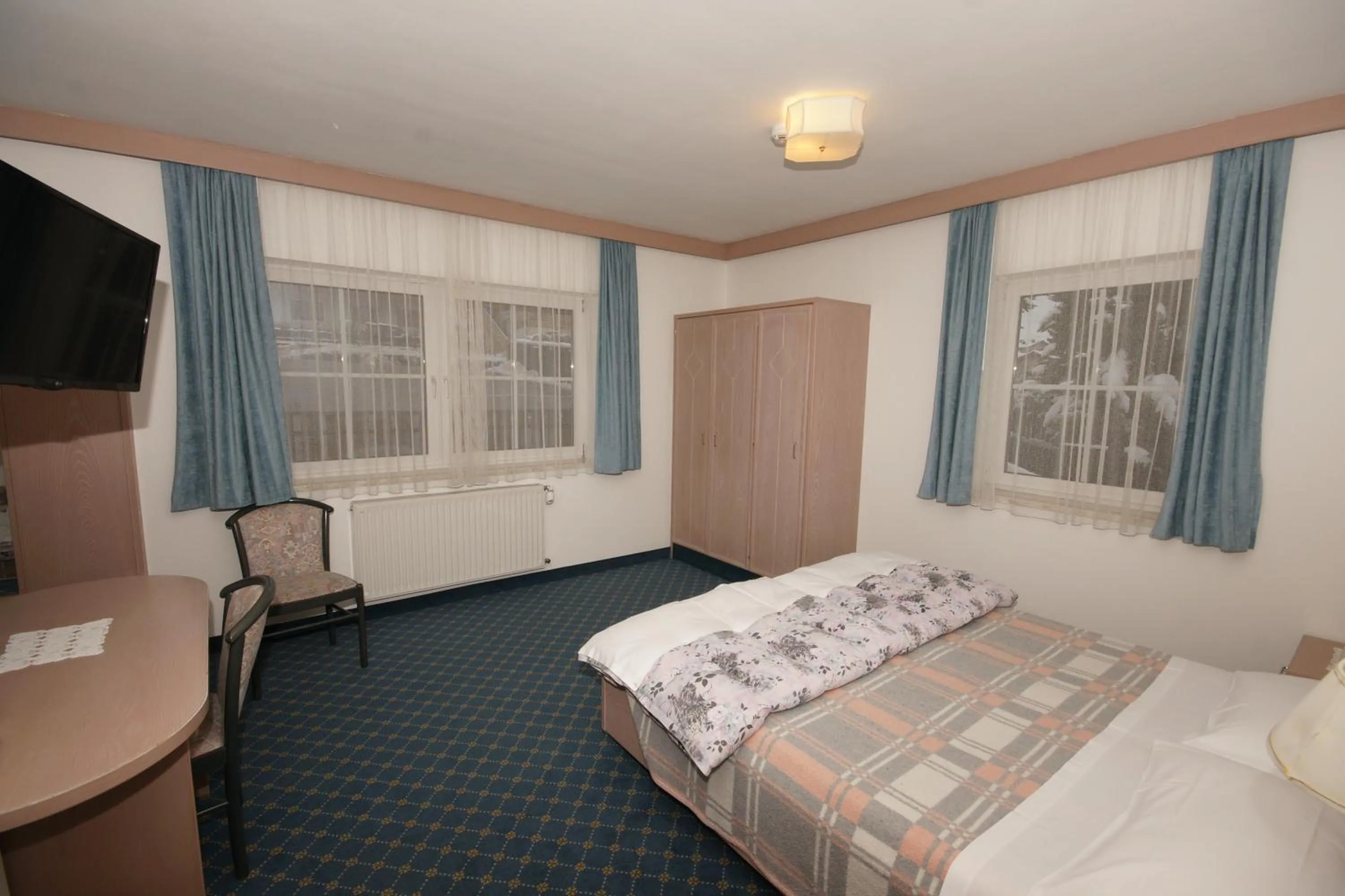 Bed in Hotel Villa Mozart