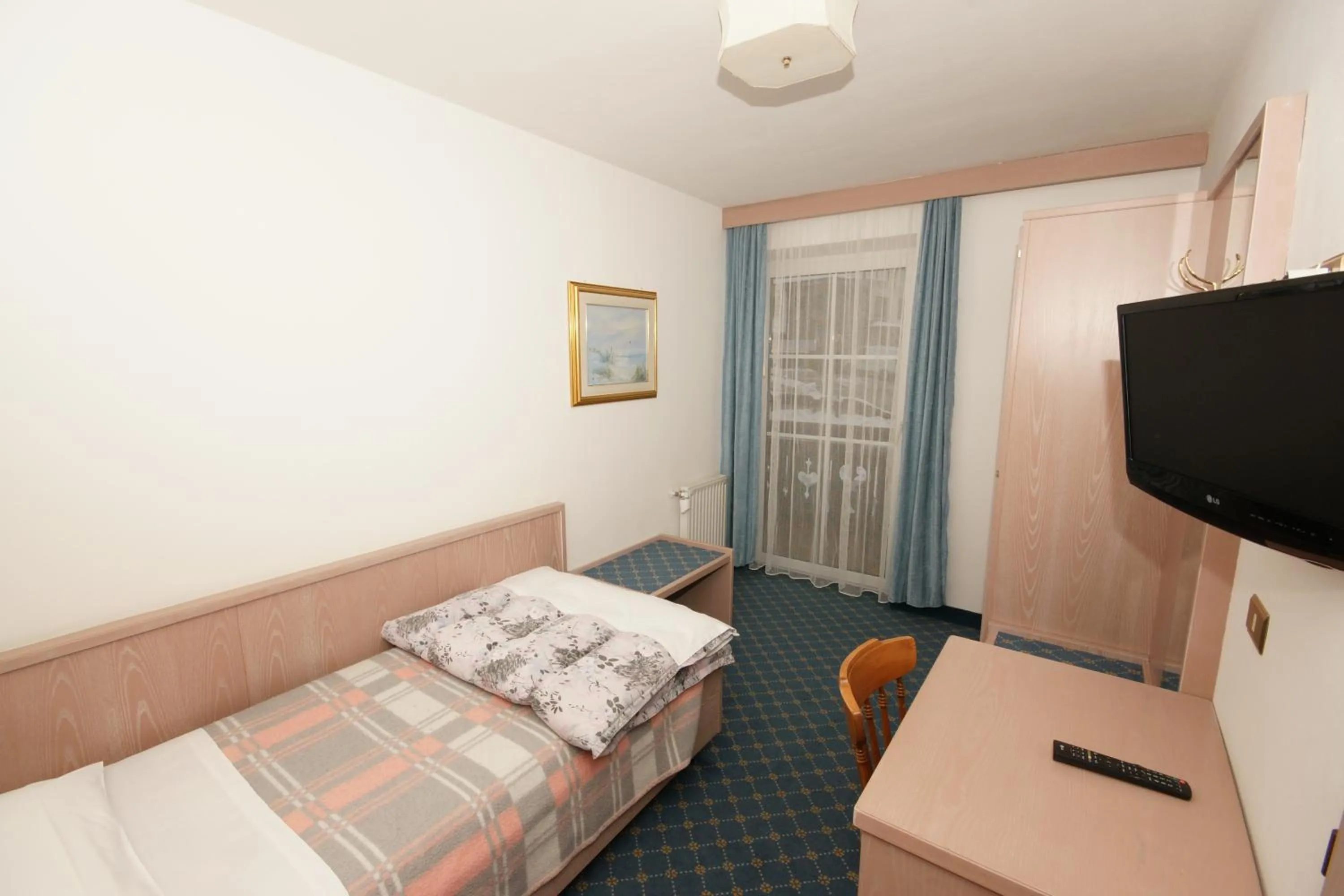 Bed in Hotel Villa Mozart