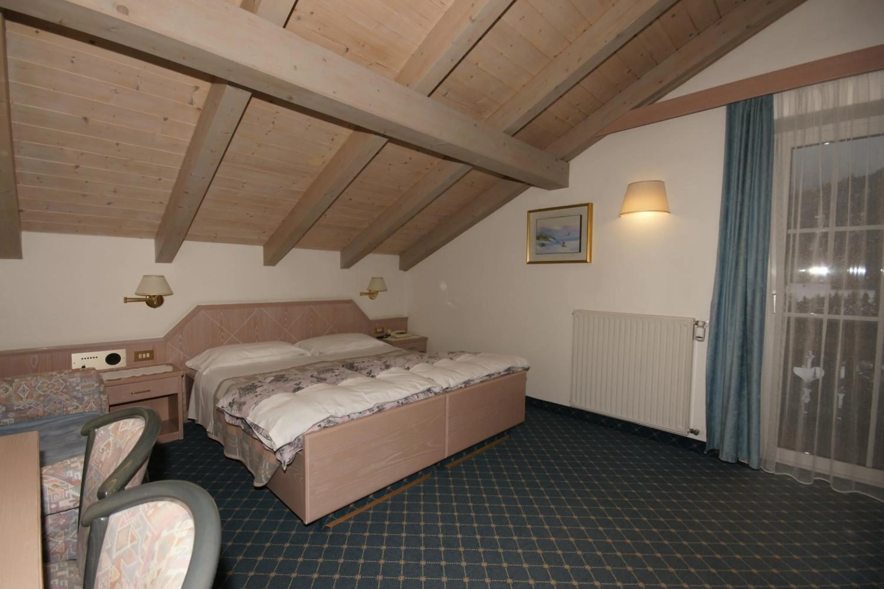 Bed in Hotel Villa Mozart