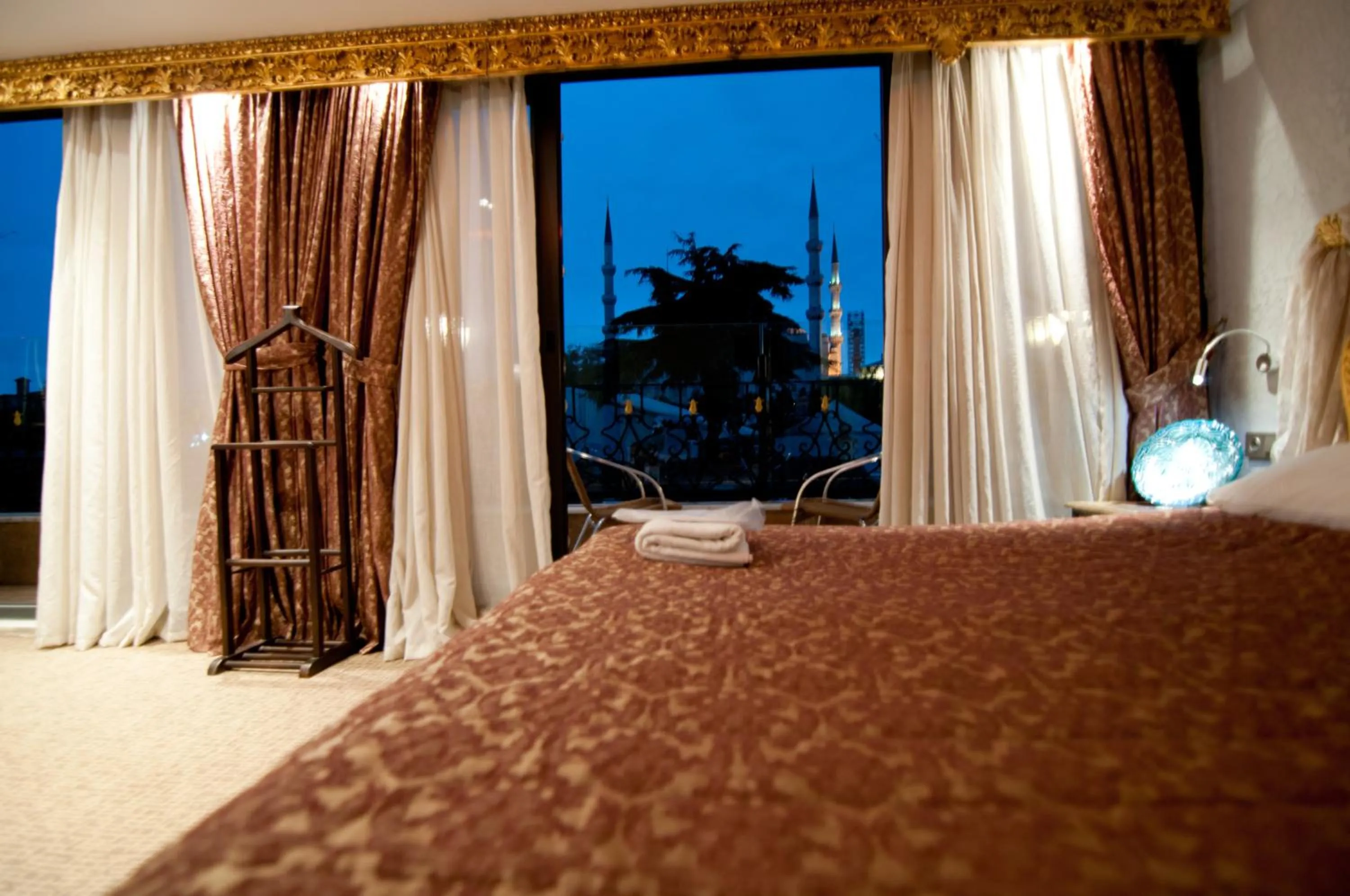 View (from property/room), Bed in Grand Ambiance Hotel