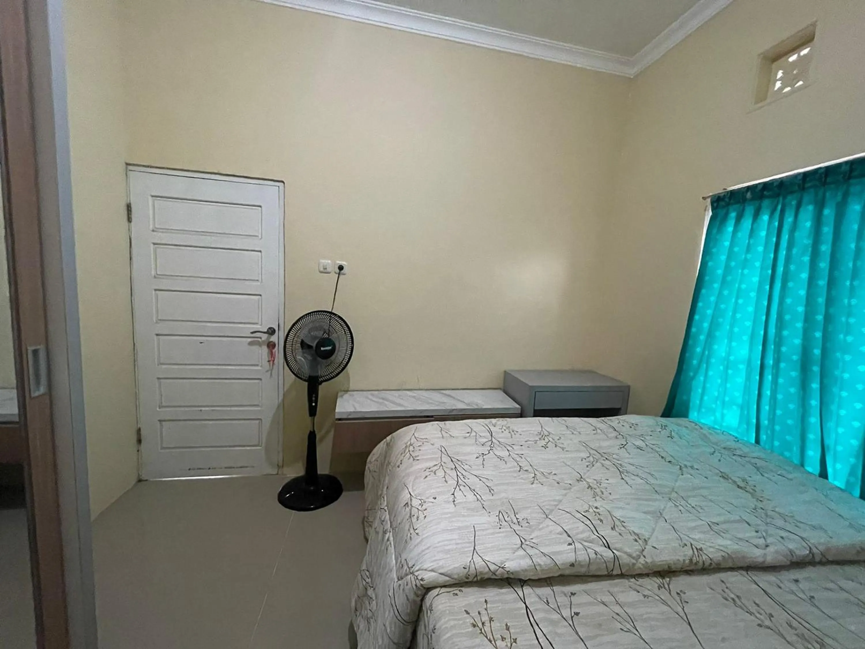 Bed in Villa Palacios Syari'ah Bukittinggi