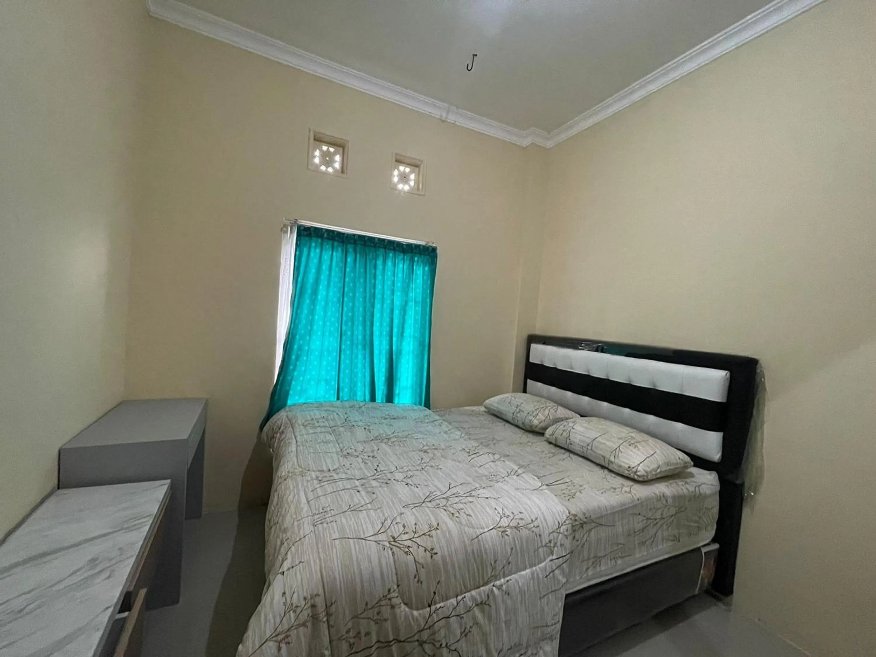 Bed in Villa Palacios Syari'ah Bukittinggi