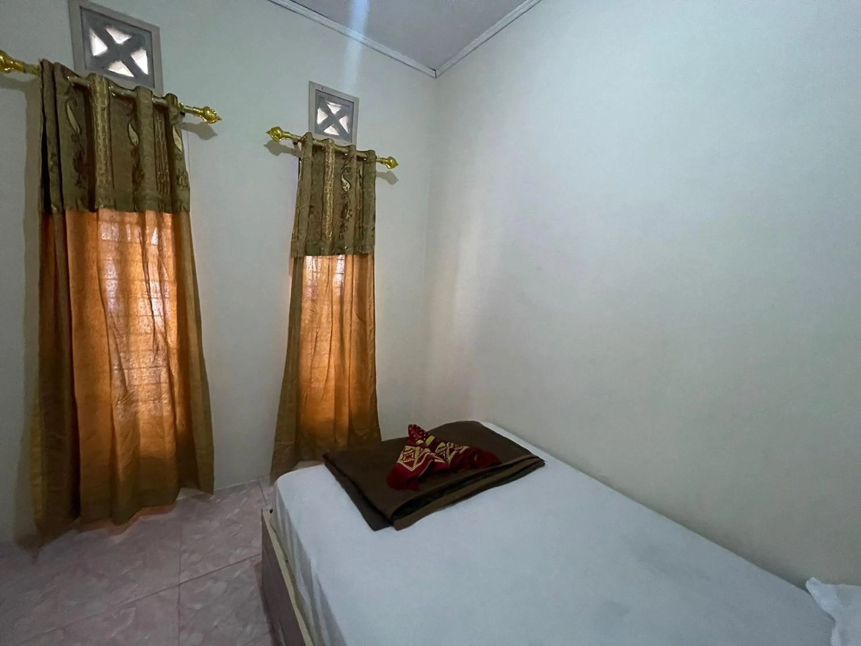 Bed in Villa Palacios Syari'ah Bukittinggi