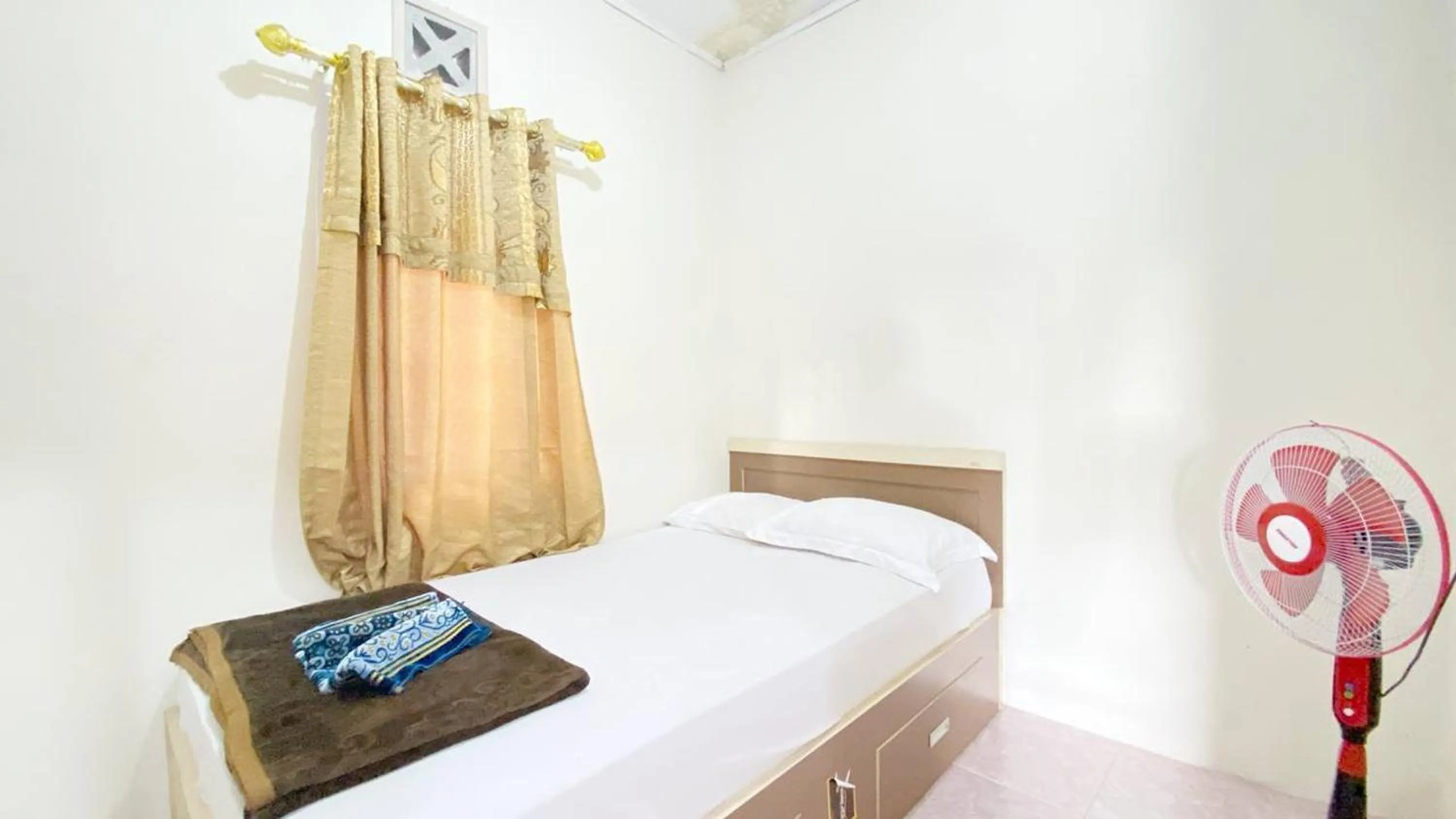 Bed in Villa Palacios Syari'ah Bukittinggi