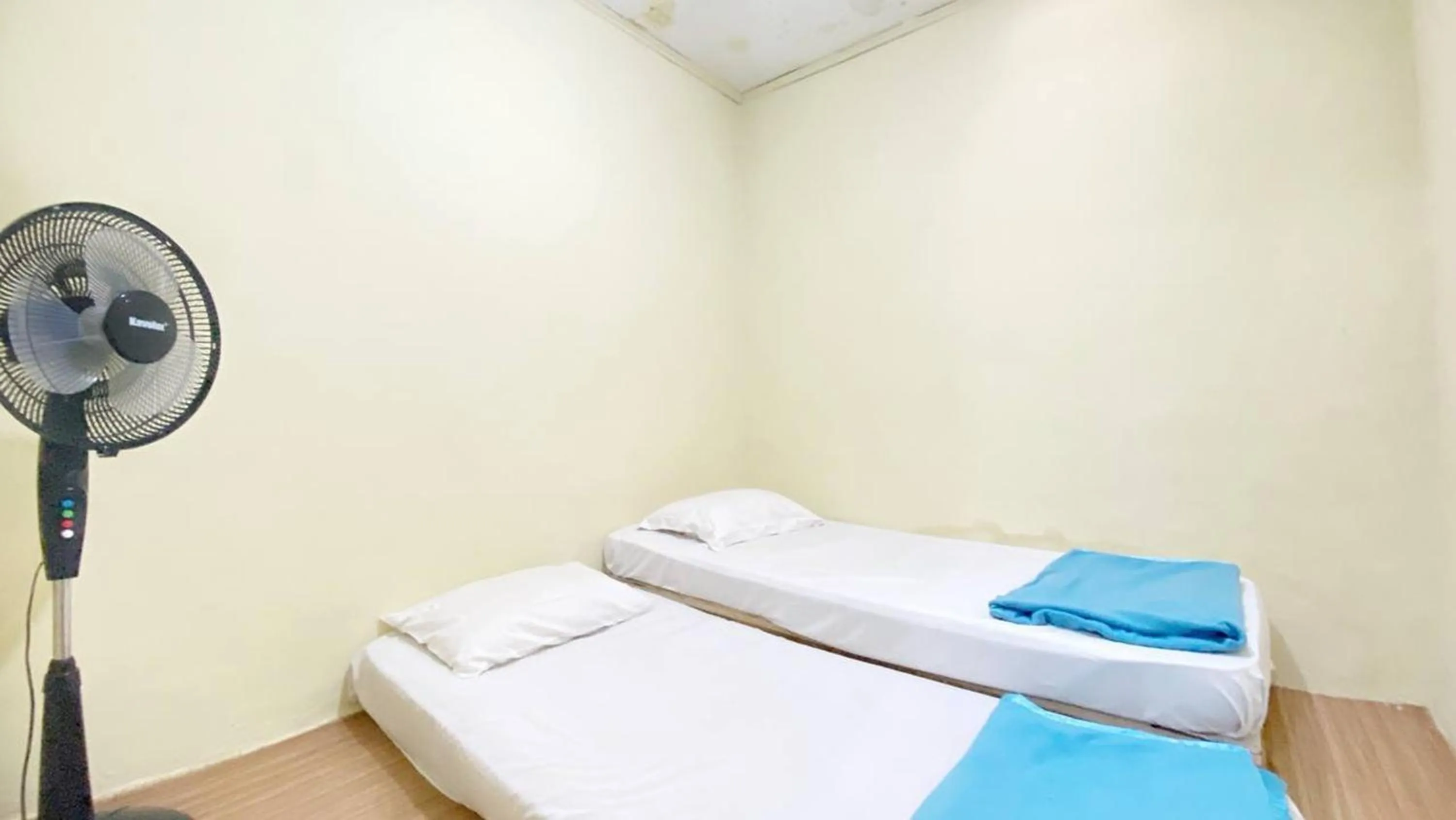 Bed in Villa Palacios Syari'ah Bukittinggi