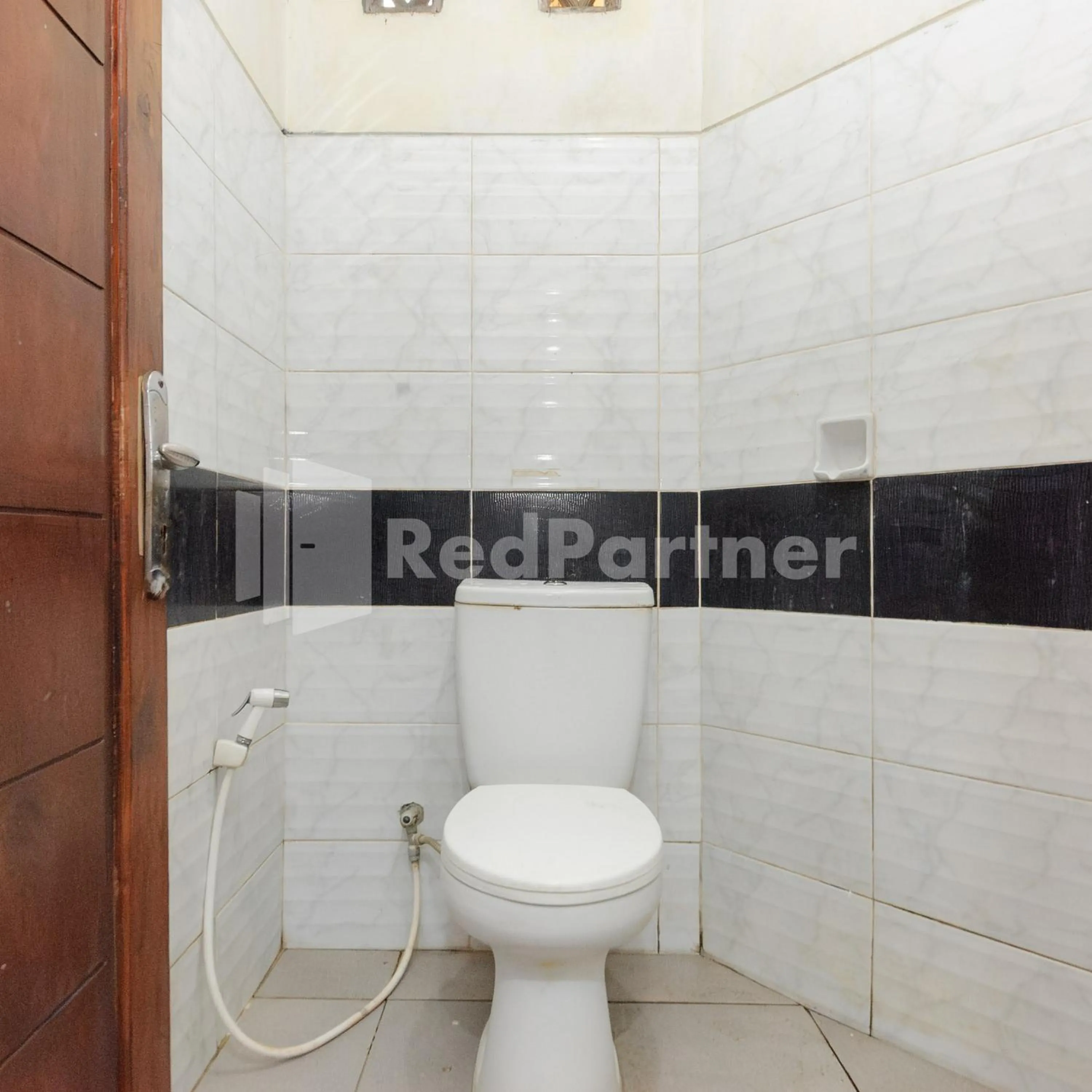 Bathroom in Wisma 24 at Hankam Puncak RedPartner