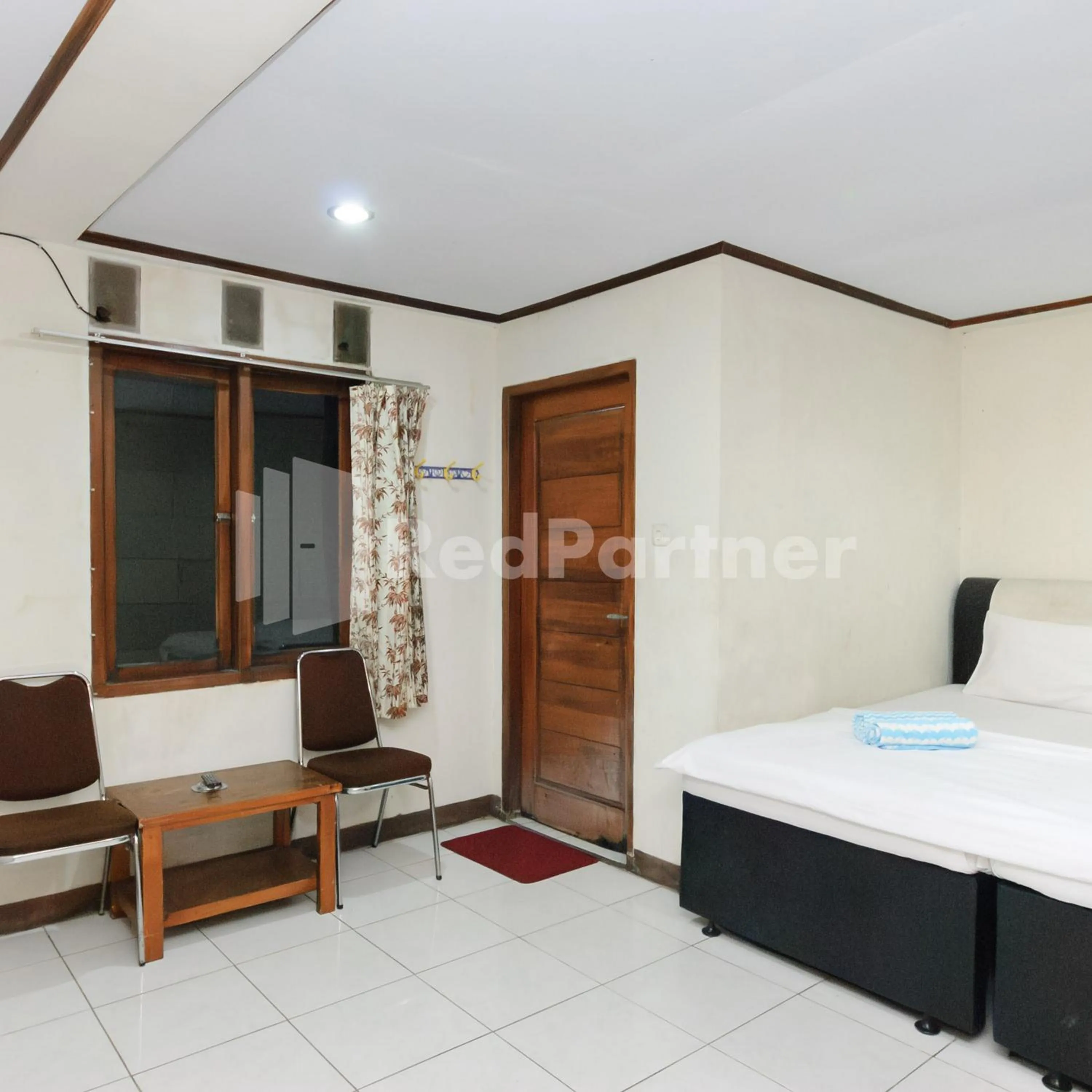 Bedroom, Bed in Wisma 24 at Hankam Puncak RedPartner