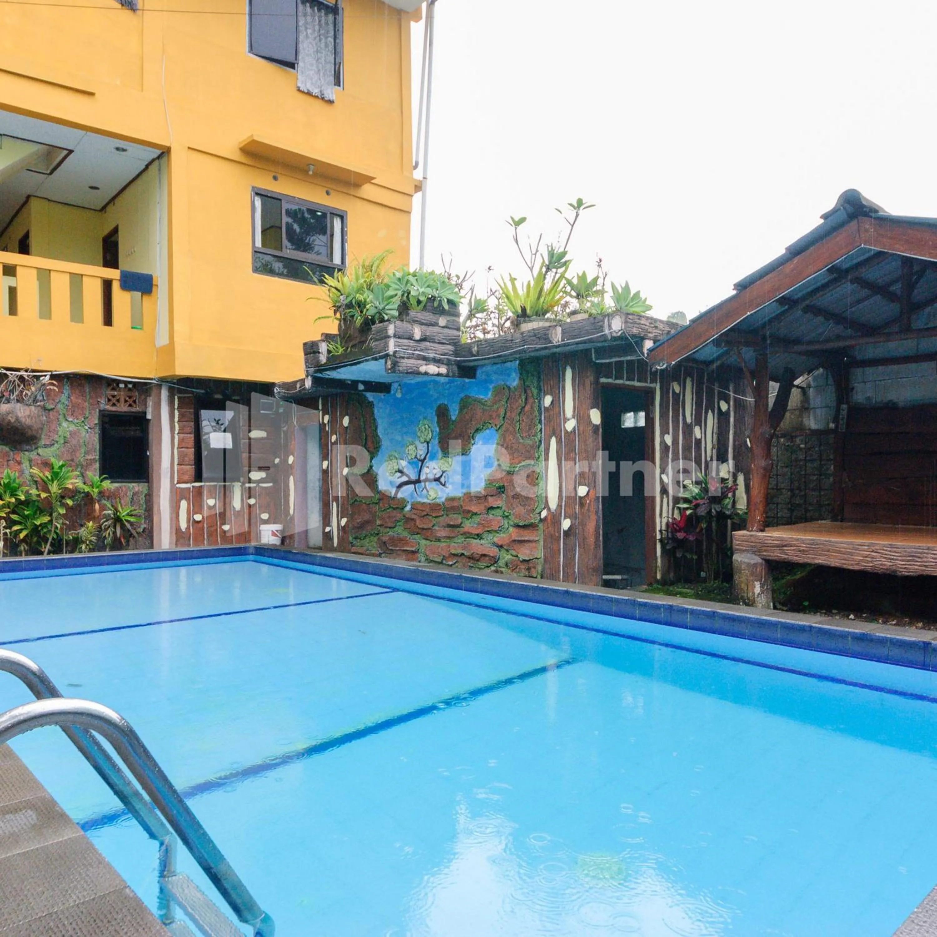Swimming pool in Wisma 24 at Hankam Puncak RedPartner