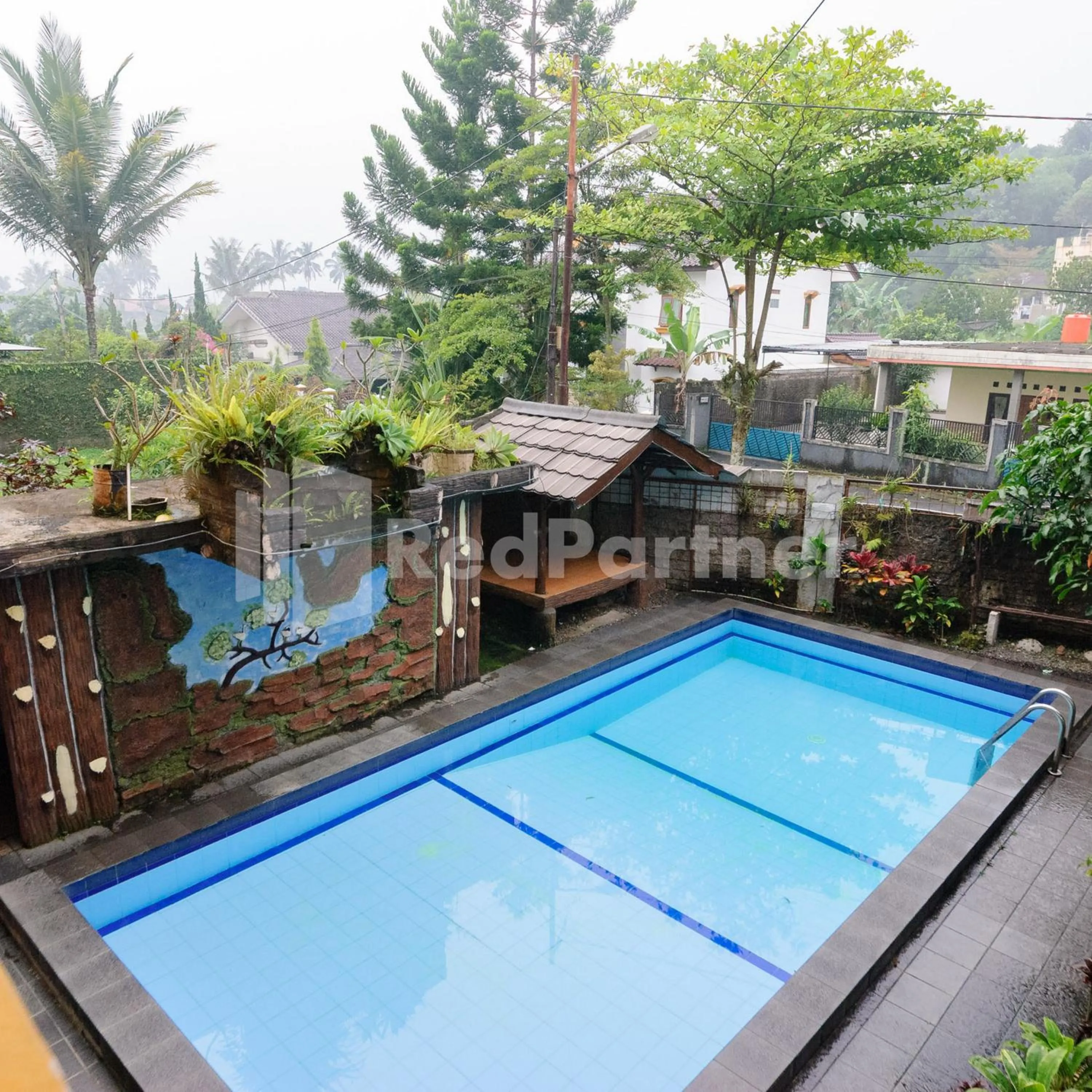 Swimming pool in Wisma 24 at Hankam Puncak RedPartner