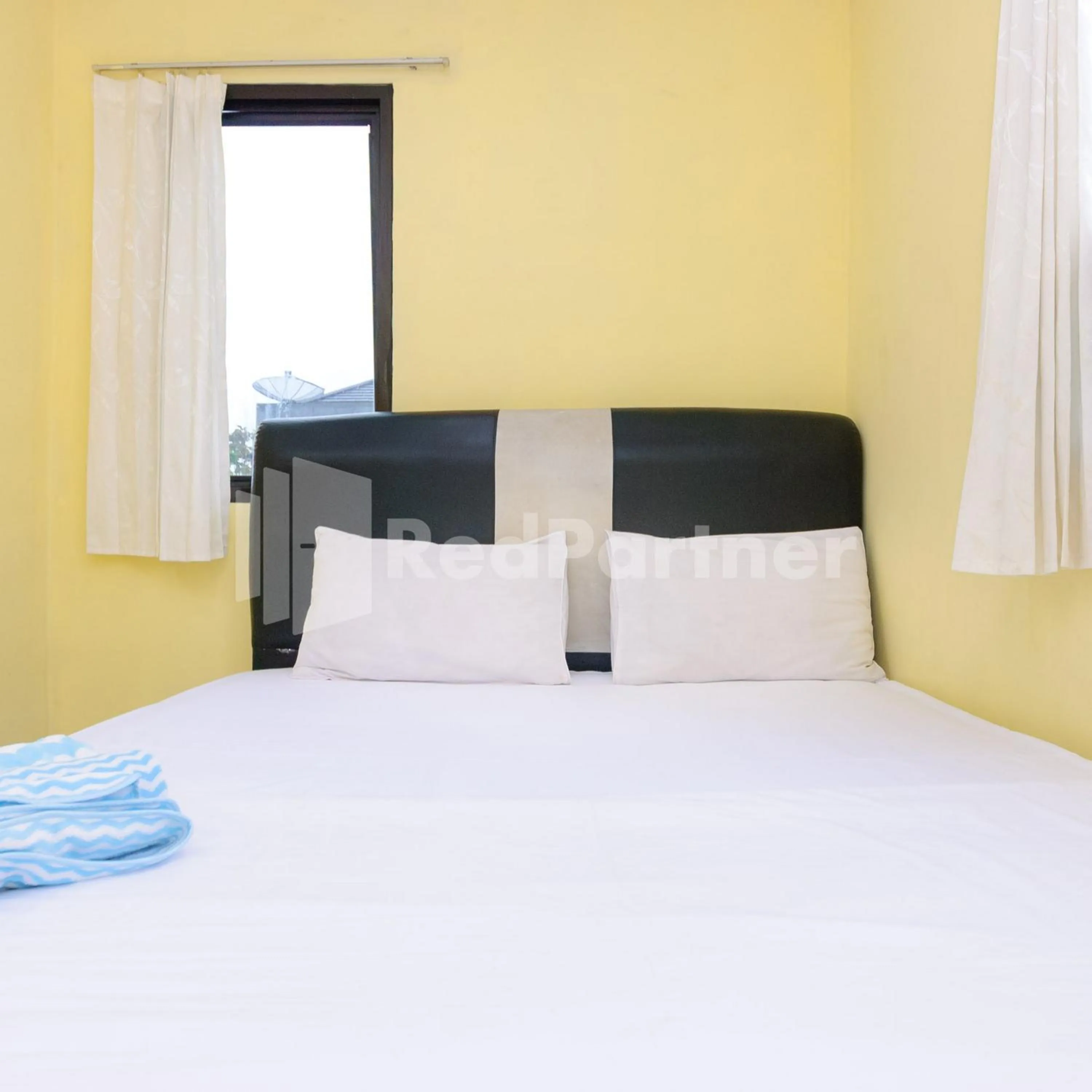 Bedroom, Bed in Wisma 24 at Hankam Puncak RedPartner