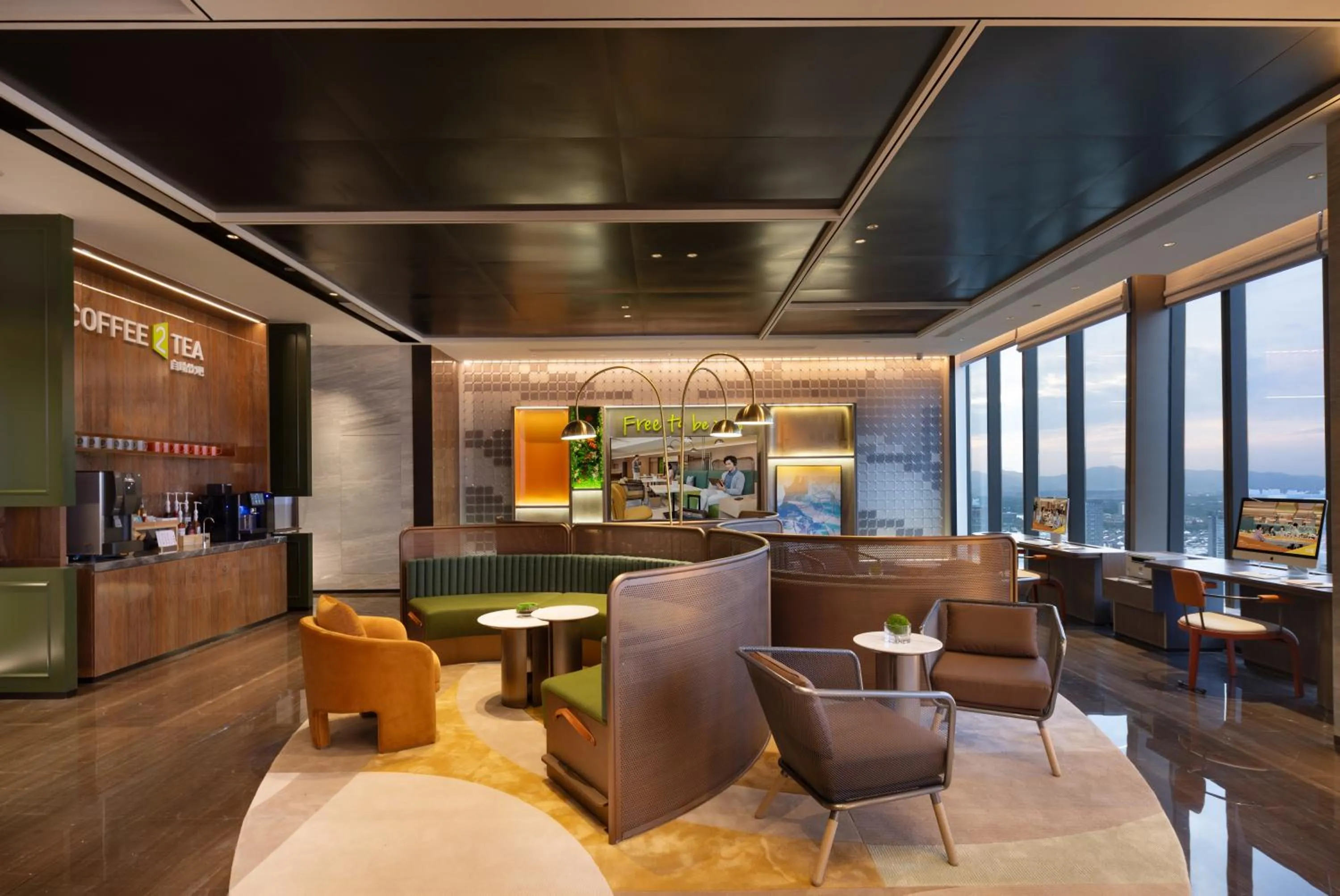 Seating area in Home2 Suite by Hilton Yiwu World Trade Center