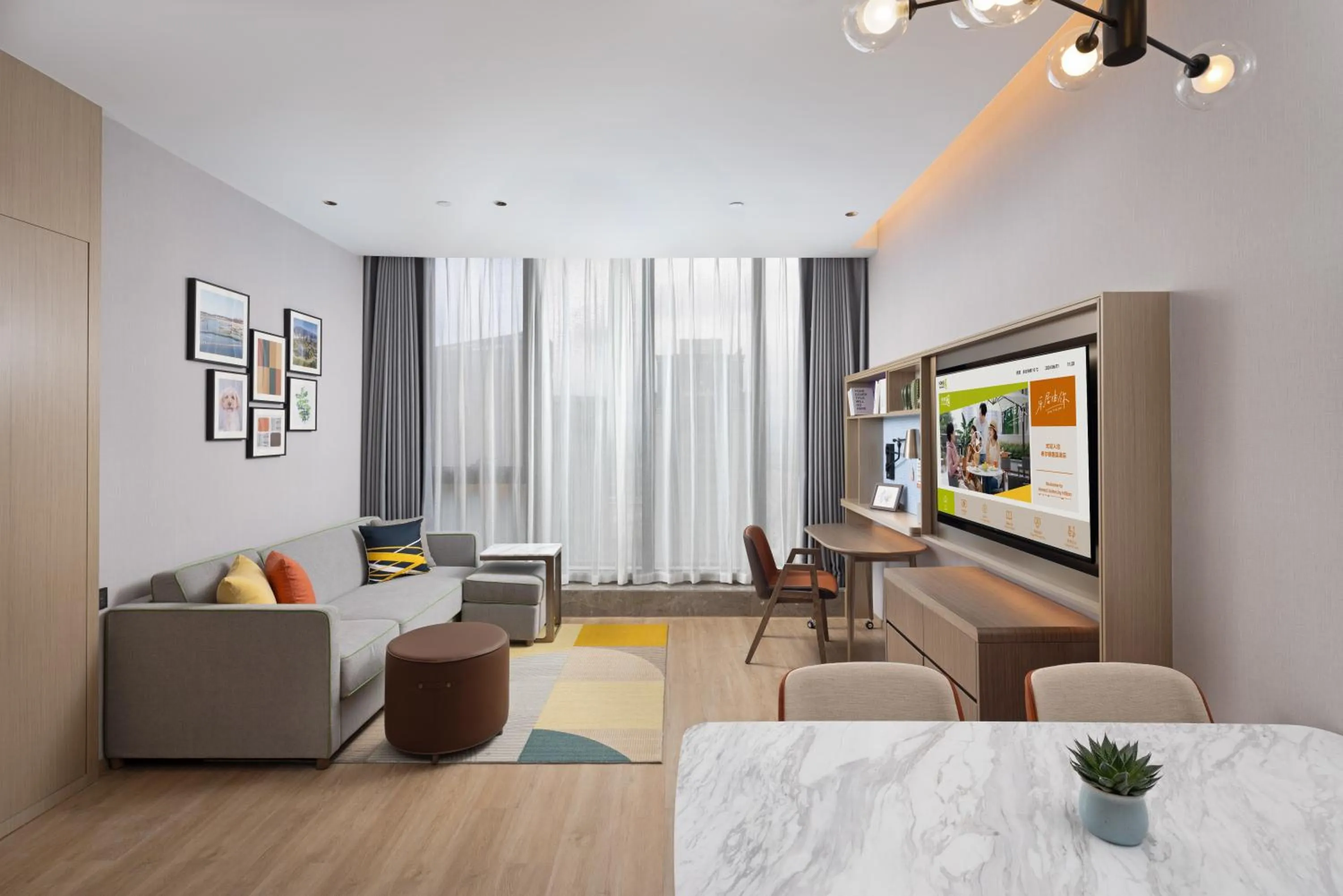 TV and multimedia in Home2 Suite by Hilton Yiwu World Trade Center