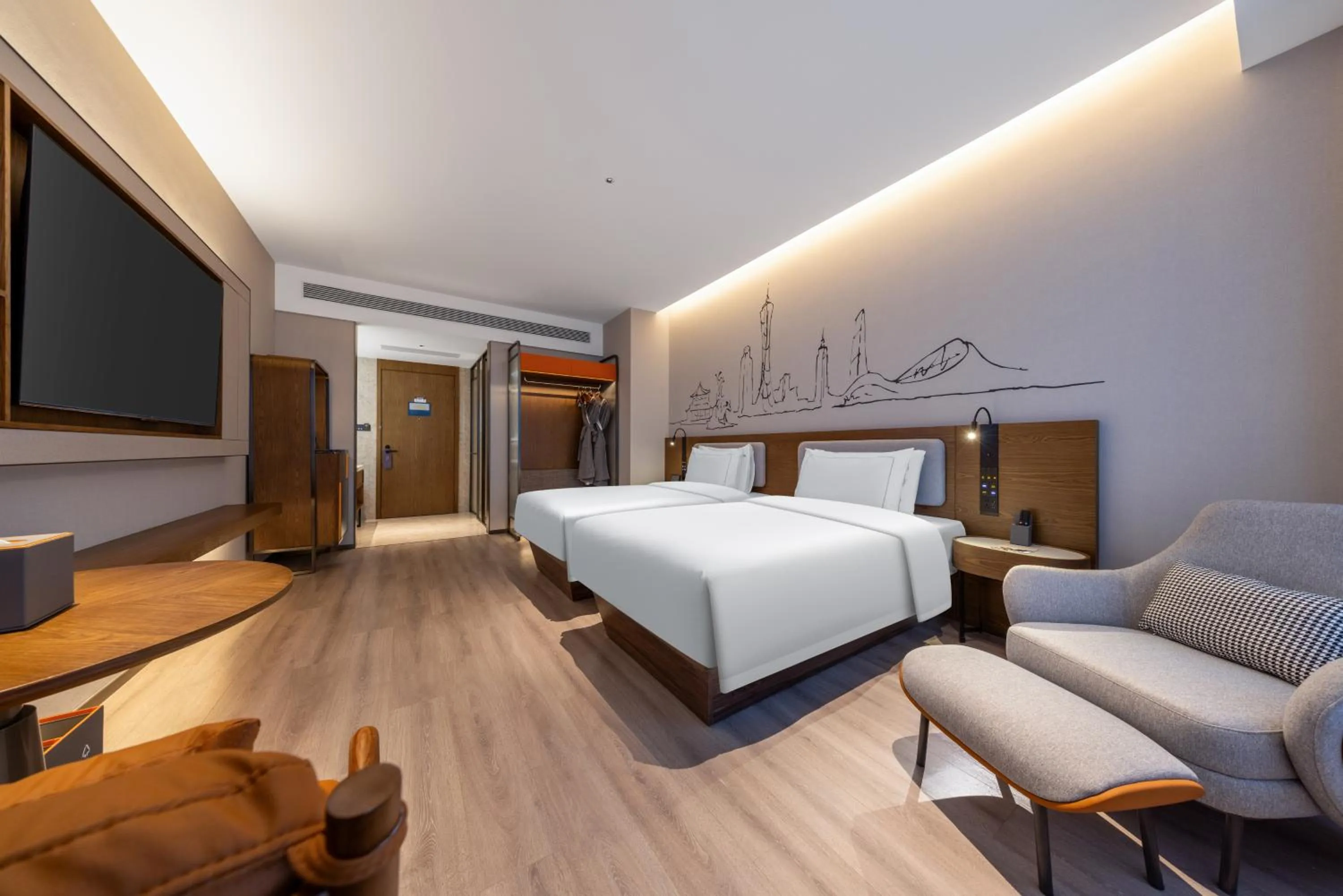 Bed in UrCove By Hyatt Guangzhou Baiyun Airport