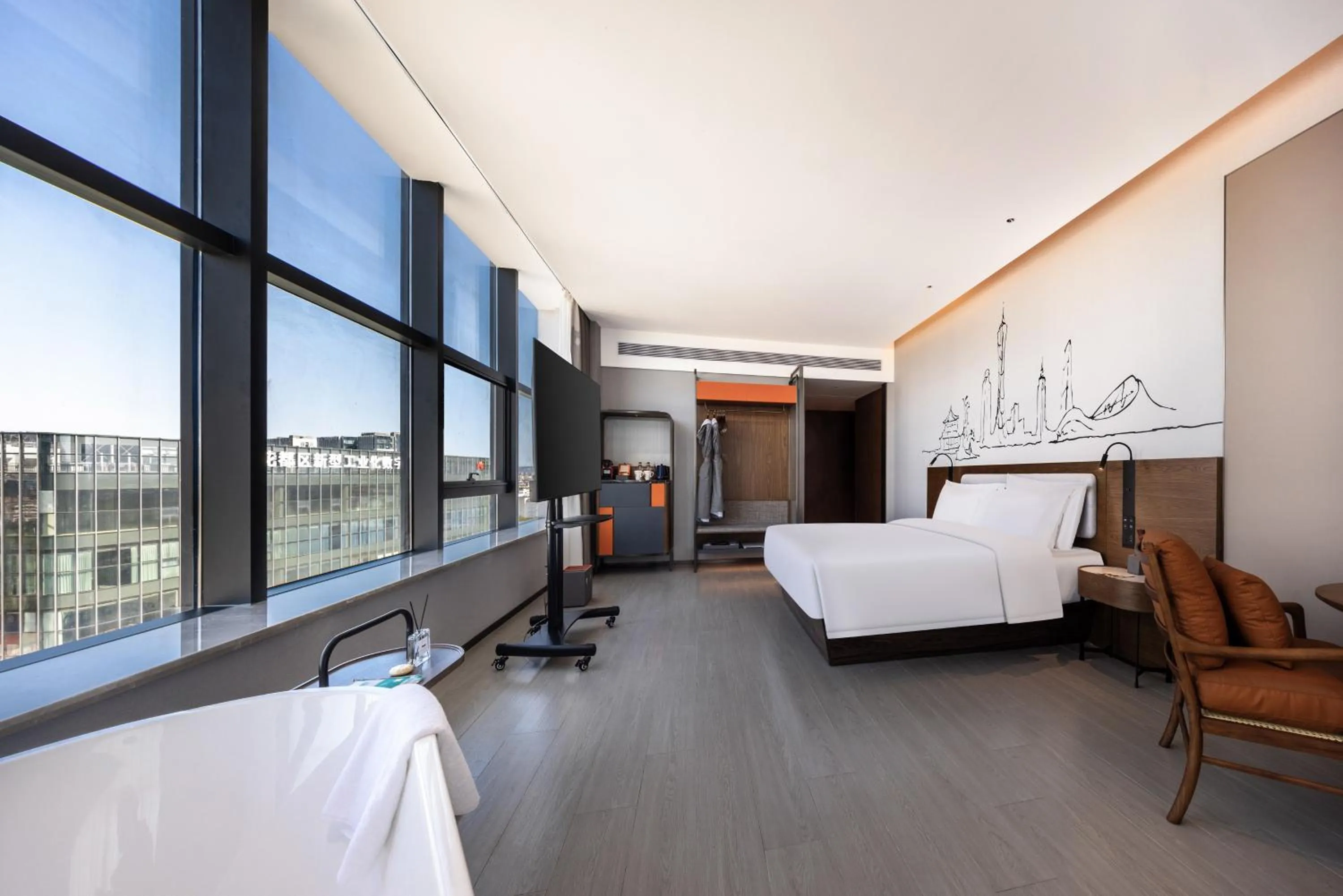 Bed in UrCove By Hyatt Guangzhou Baiyun Airport