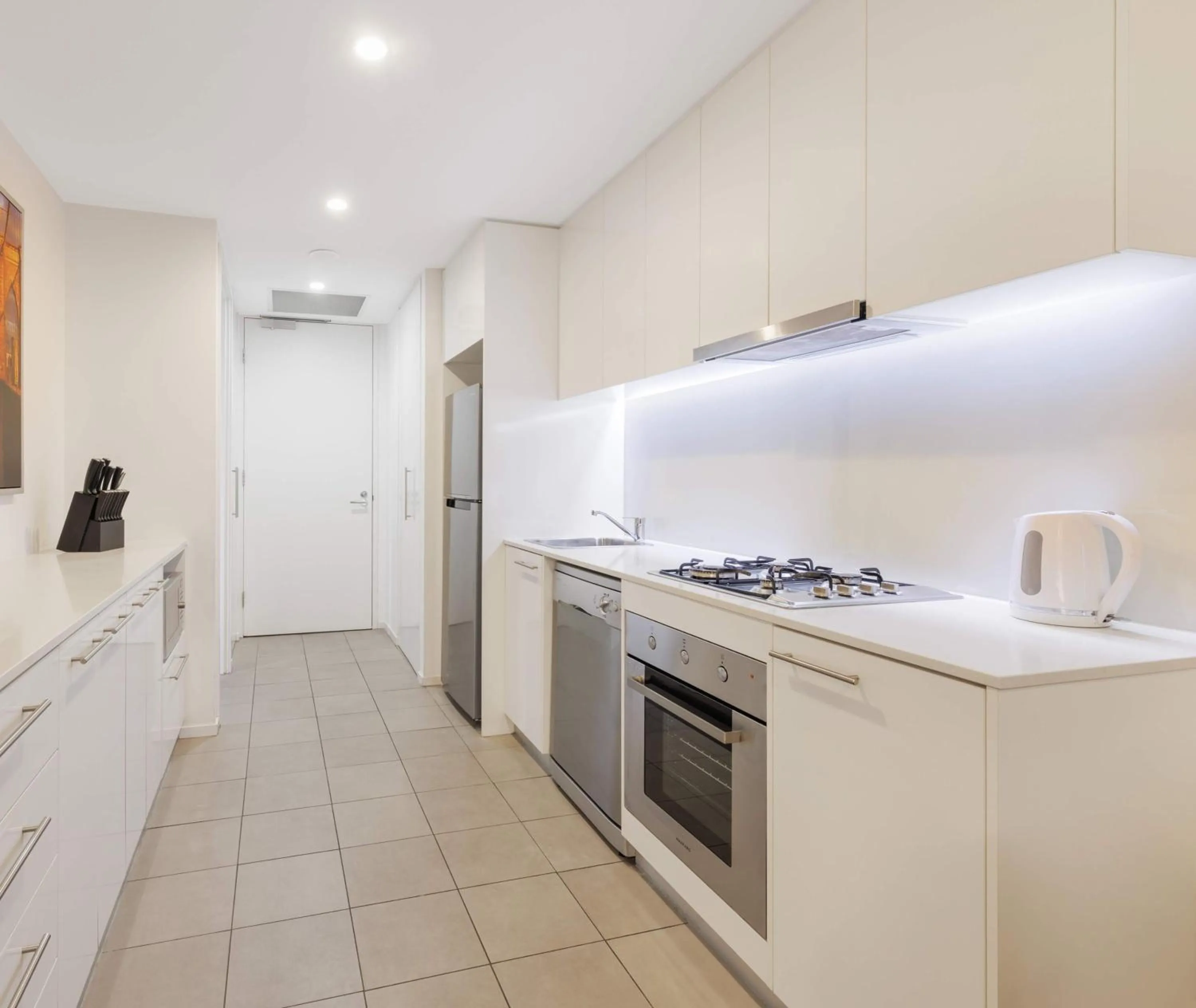 Kitchen or kitchenette in Oaks Melbourne Flemington Suites