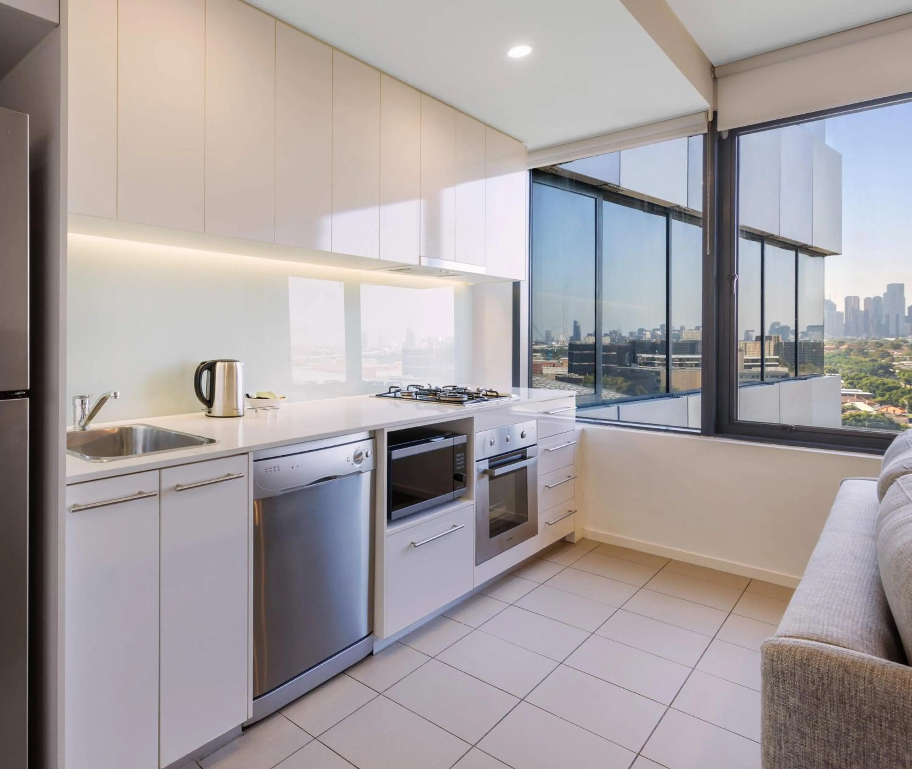 Kitchen or kitchenette in Oaks Melbourne Flemington Suites
