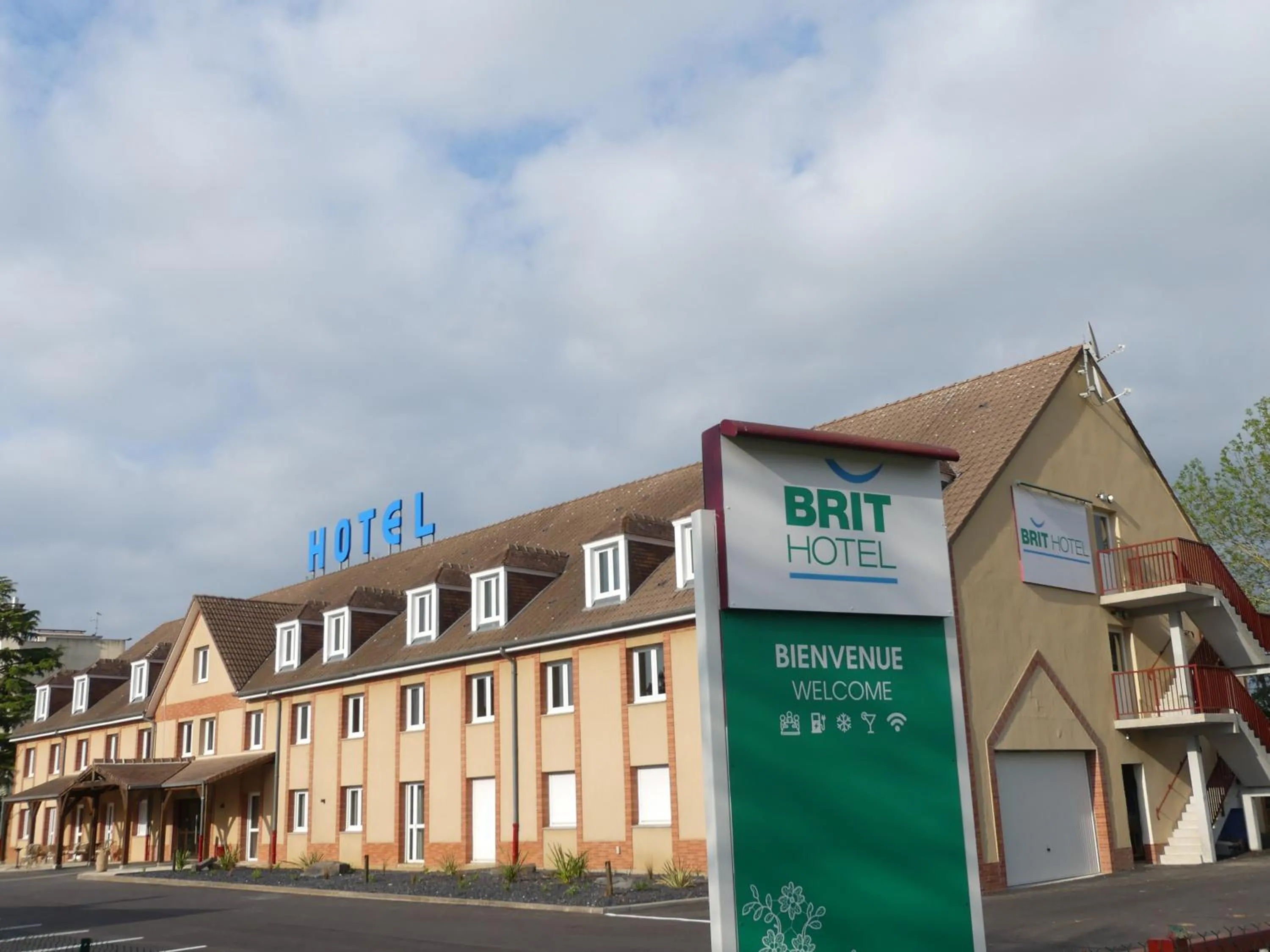 Property building in Brit Hotel Confort Alençon