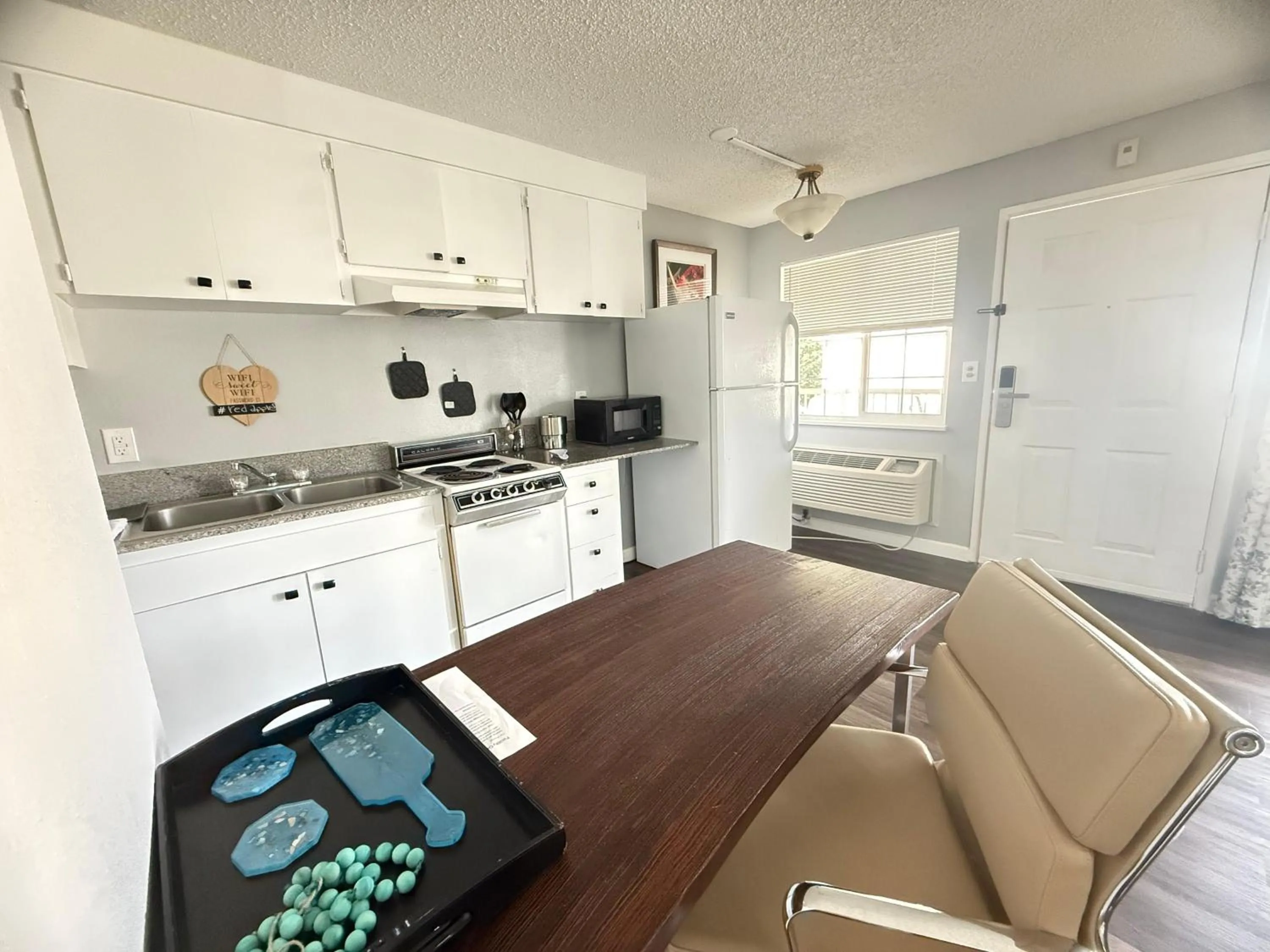 One Queen Bed With Kitchen in Naval Suites by FairBridge