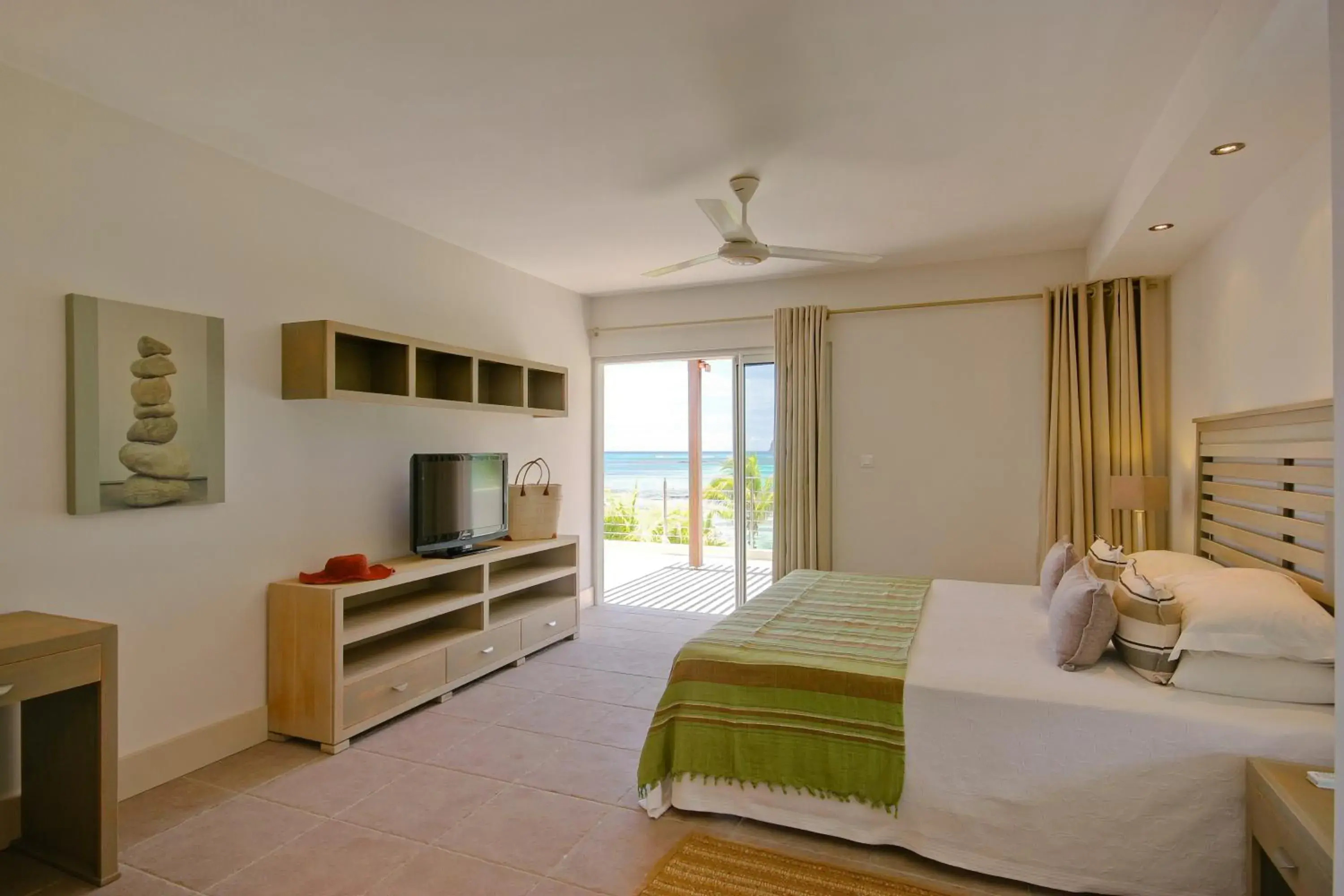 Photo of the whole room, Bed in Cape Point Seafront by LOV Mauritius Photo of the whole room, Bed in Cape Point Seafront by LOV Mauritius