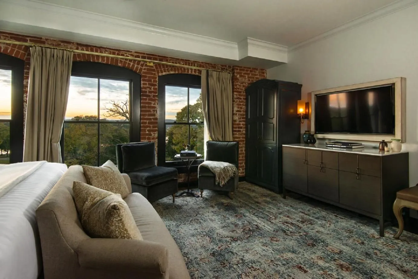 Communal lounge/ TV room in The Charmant Hotel