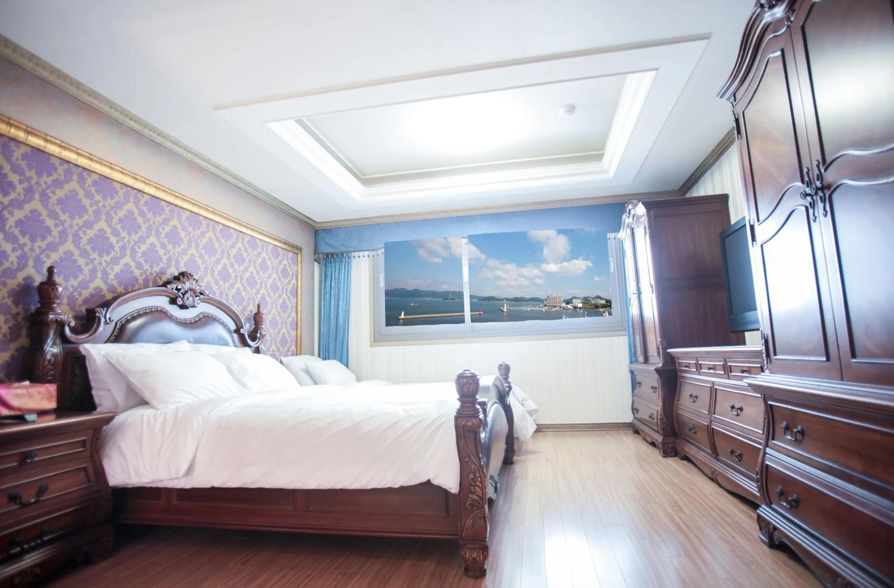 Bed in Tongyeong Bay Condo Hotel