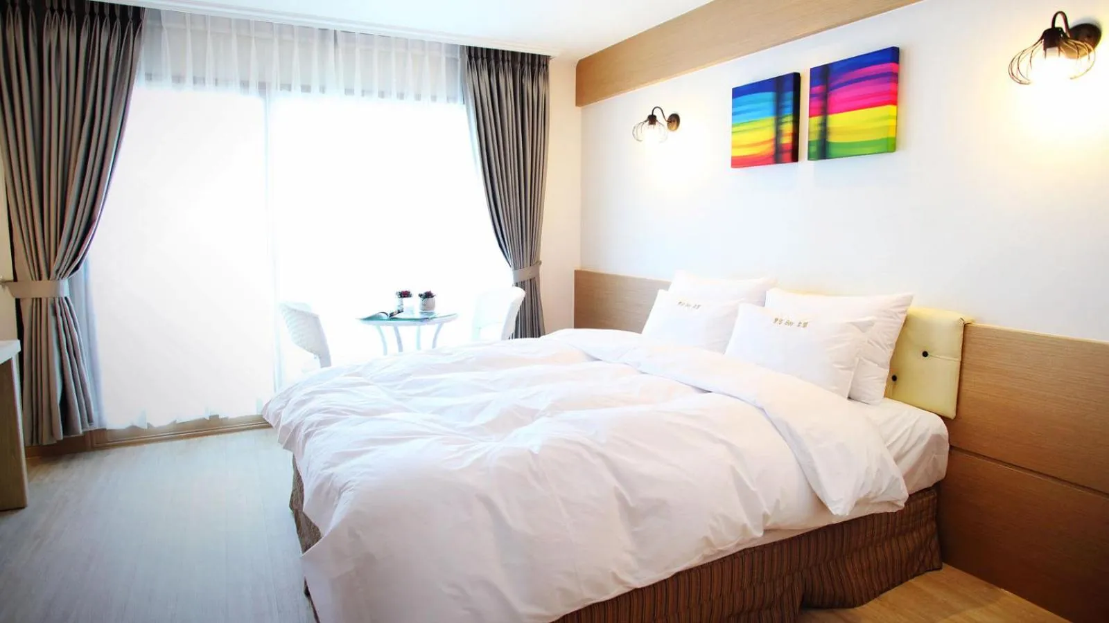 Bed in Tongyeong Bay Condo Hotel