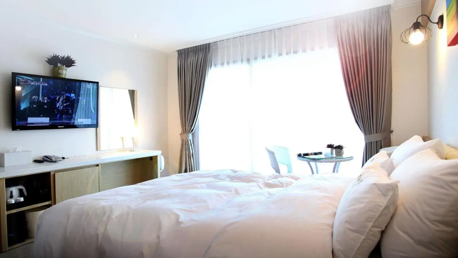 Bed in Tongyeong Bay Condo Hotel Bed in Tongyeong Bay Condo Hotel