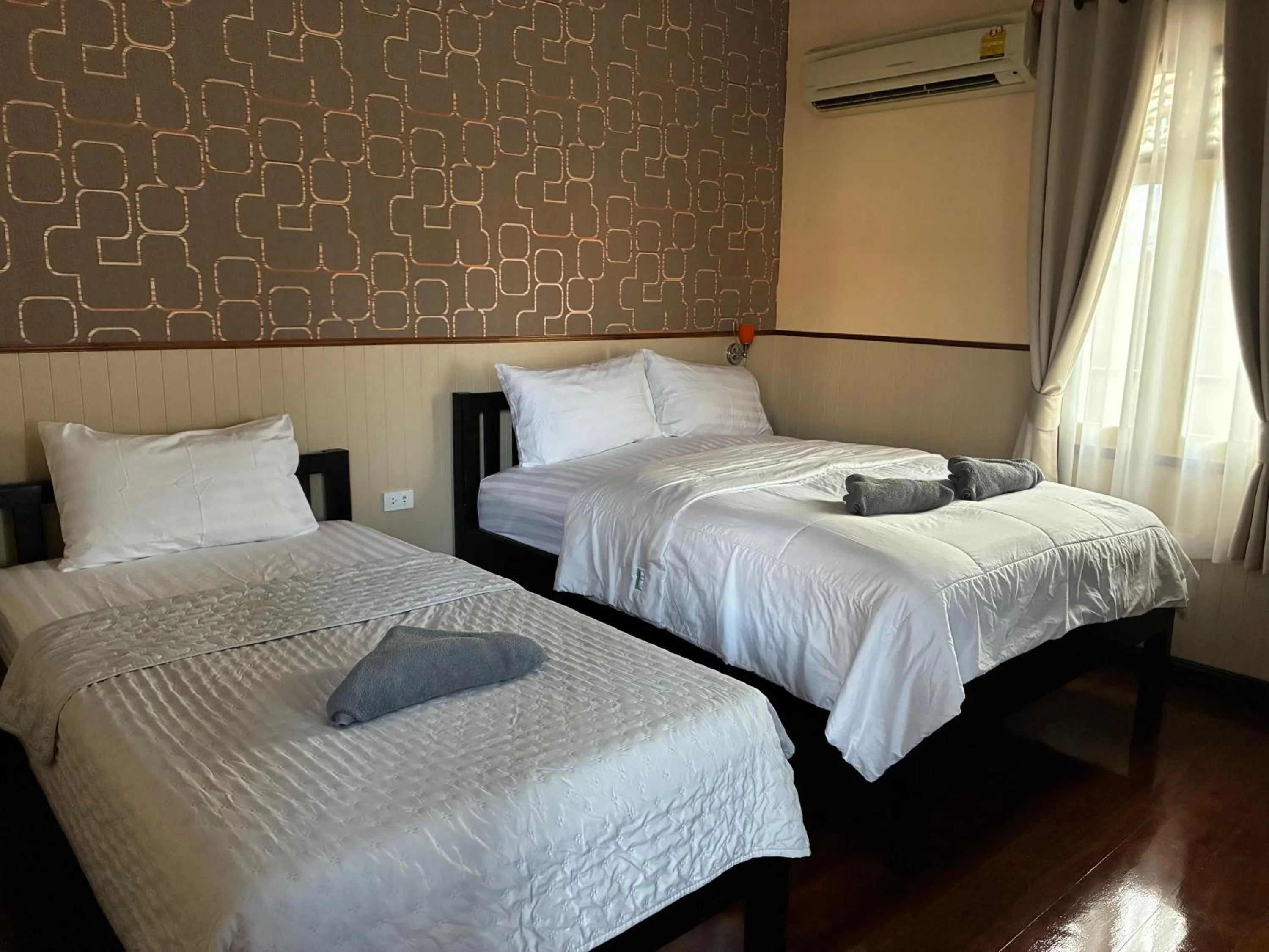 Bed in Noom Guesthouse