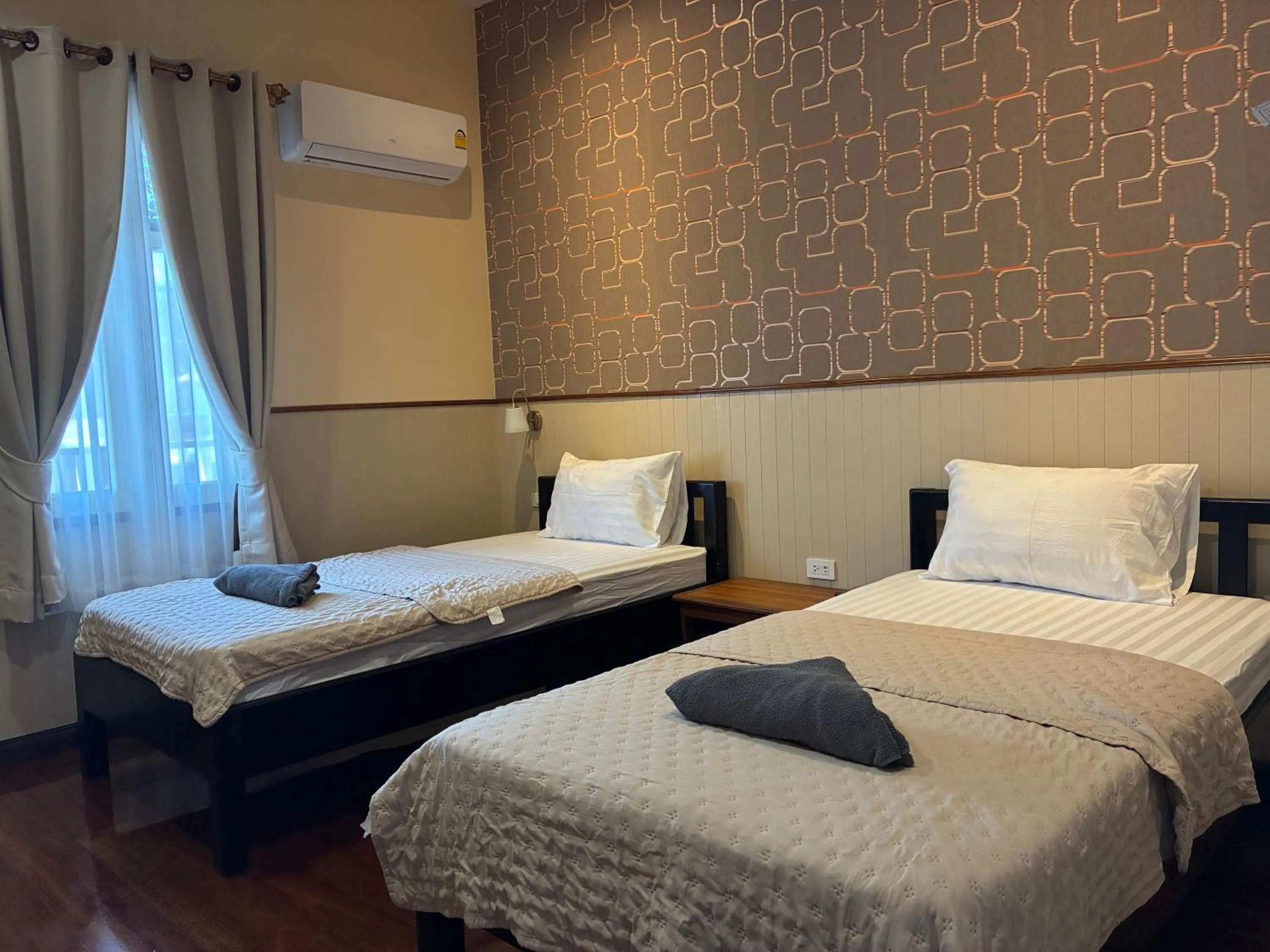 Bed in Noom Guesthouse