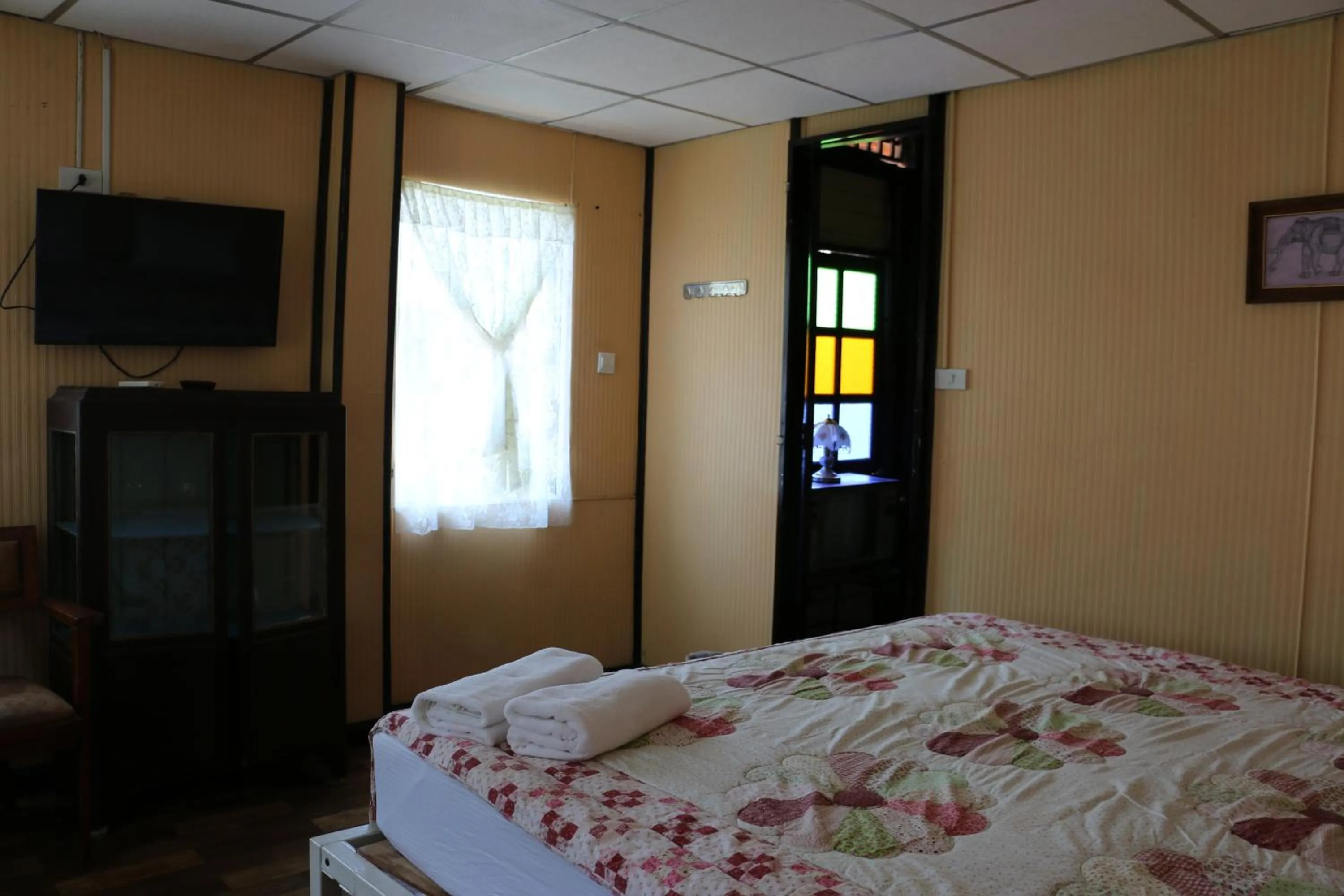 Bed in Noom Guesthouse