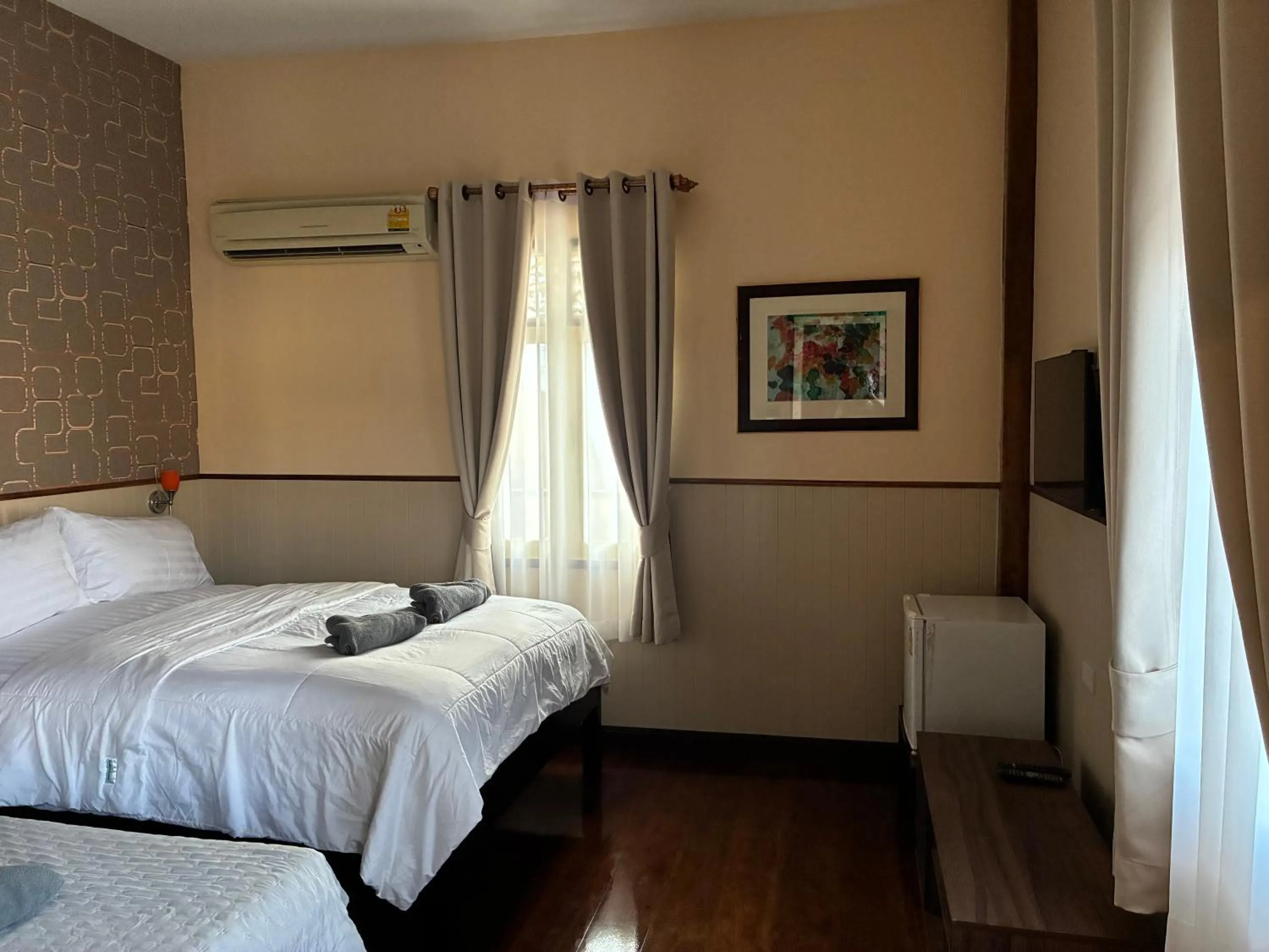 Bed in Noom Guesthouse