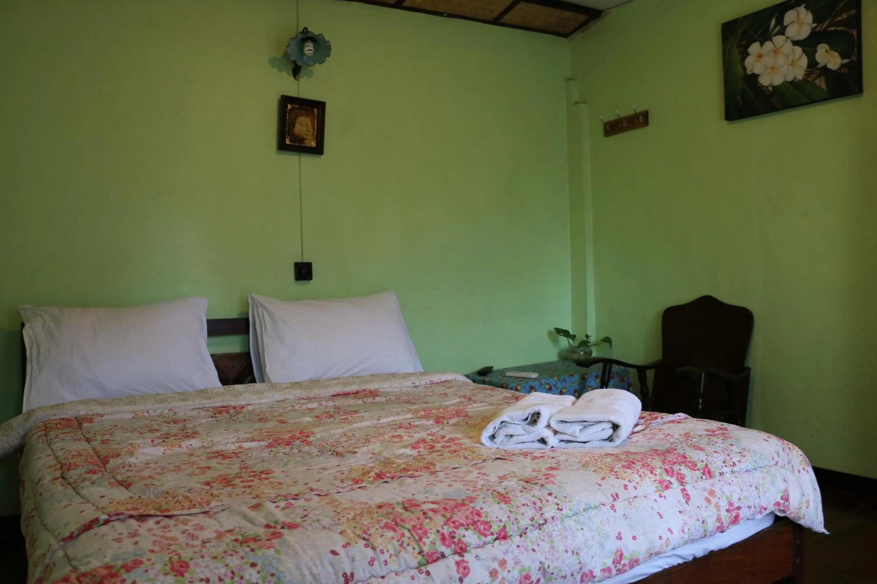 Bed in Noom Guesthouse