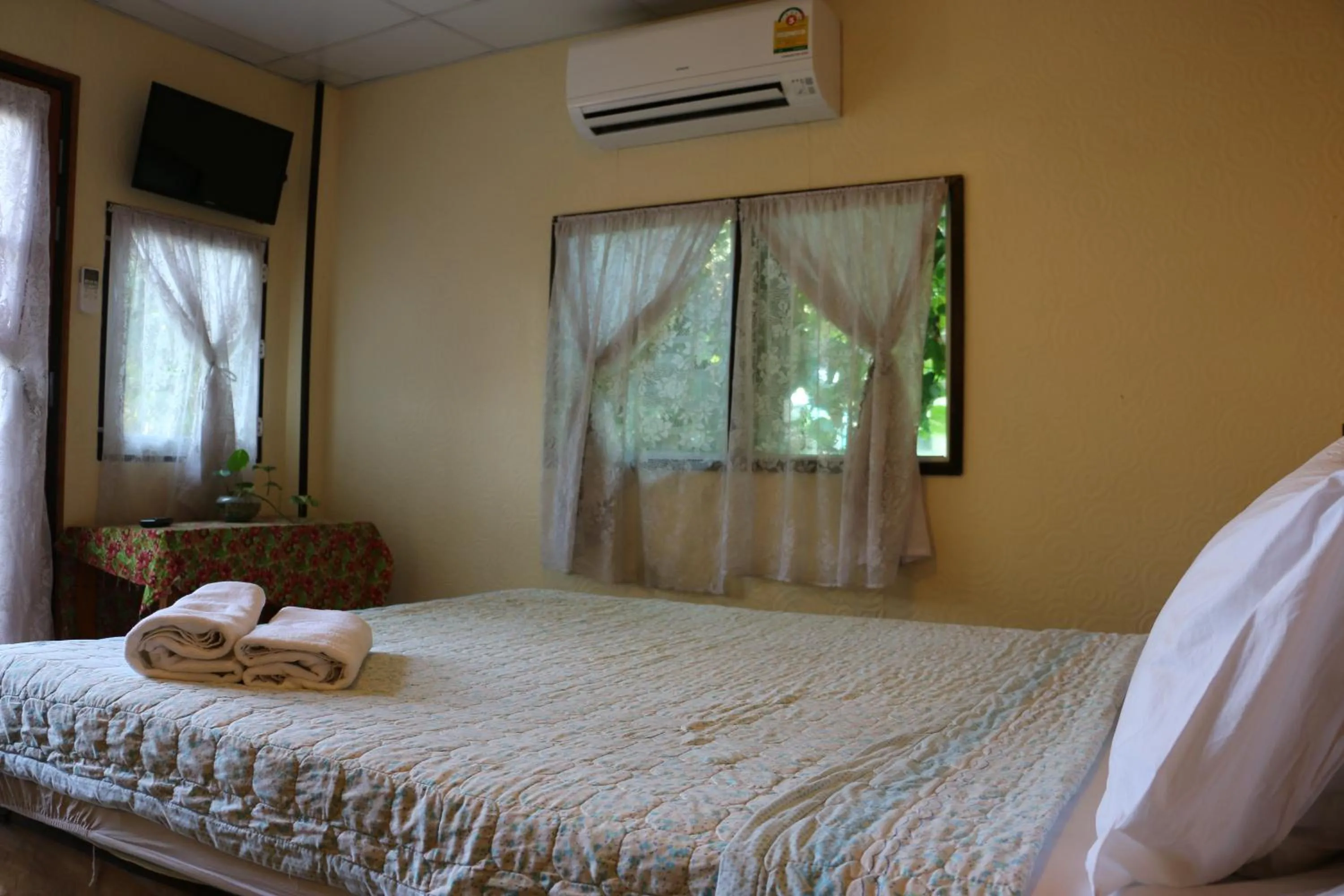 Photo of the whole room, Bed in Noom Guesthouse