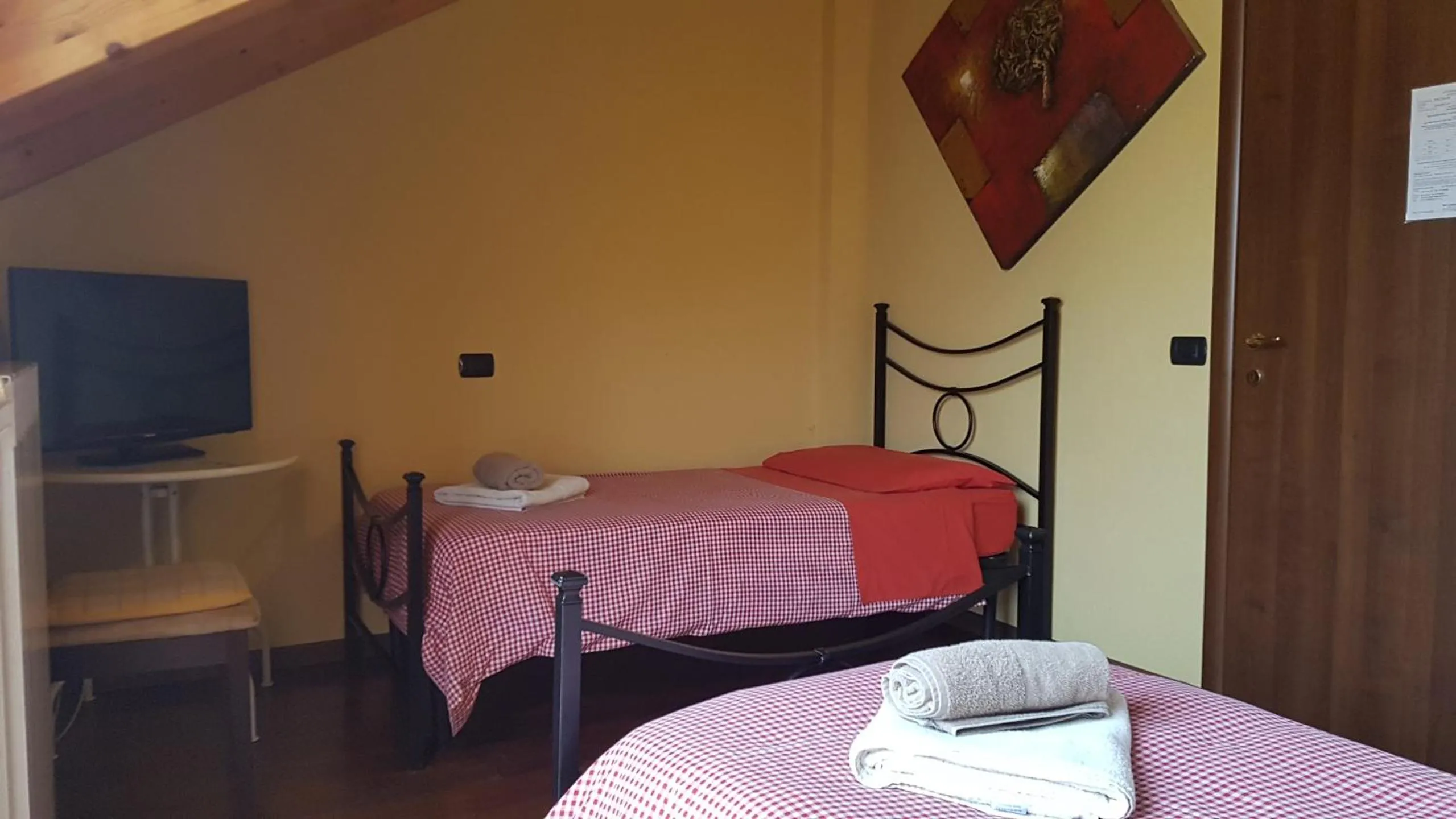 Photo of the whole room, Bed in B&B La Tartaruga