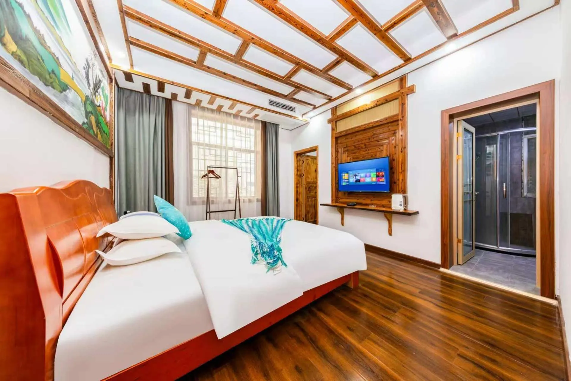 Photo of the whole room, Bed in Hotel California Zhangjiajie