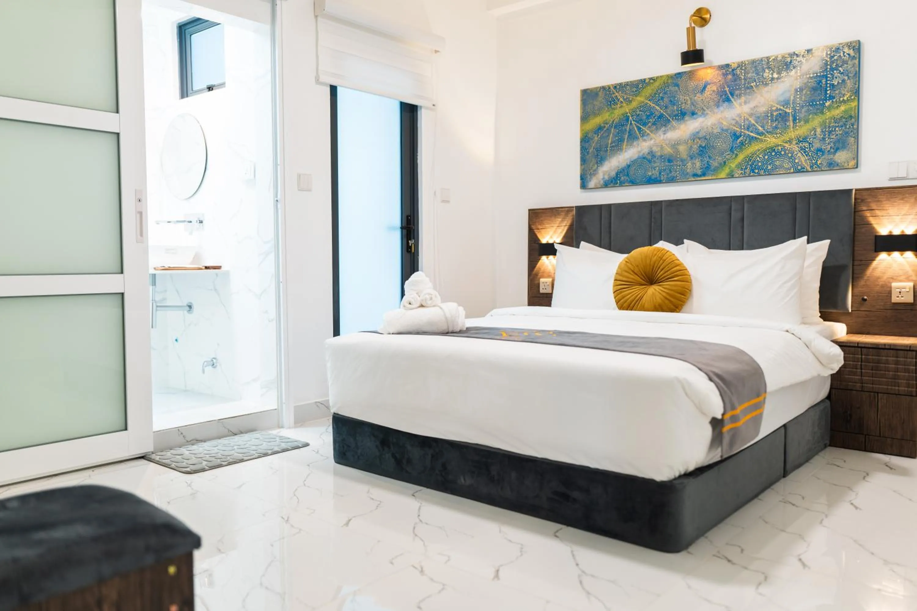 Aina Residency Beachfront Hotel