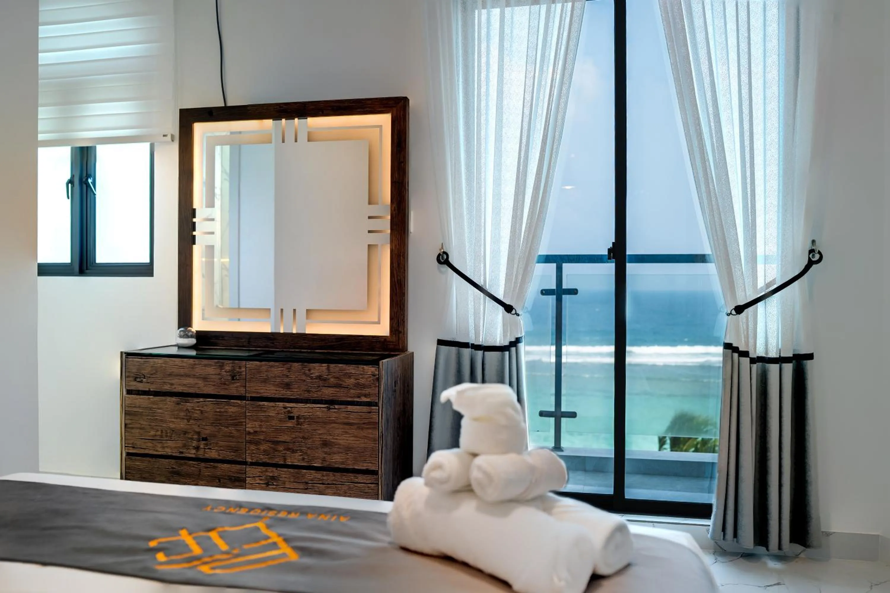 Aina Residency Beachfront Hotel