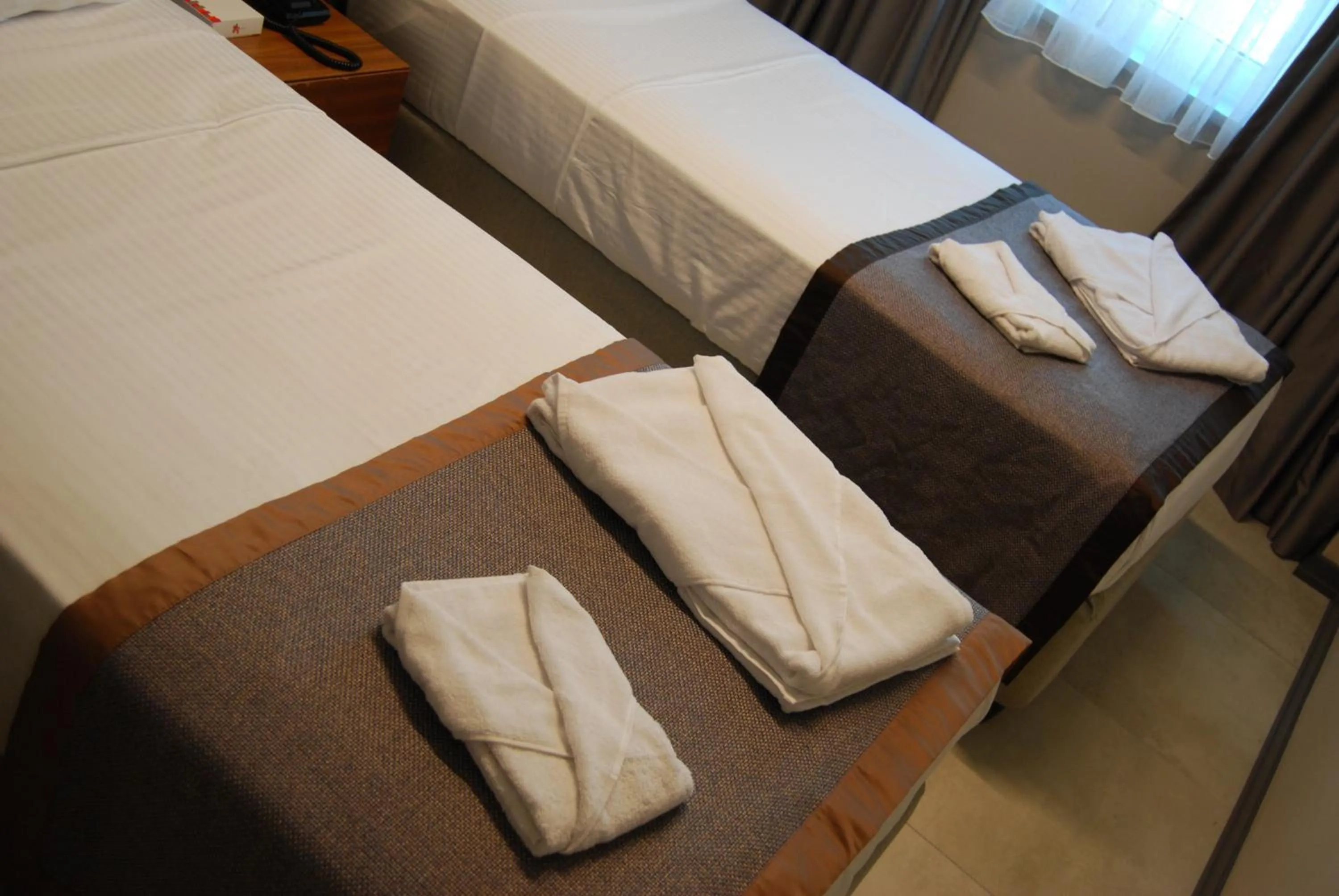 Bed in All Inn Hotel