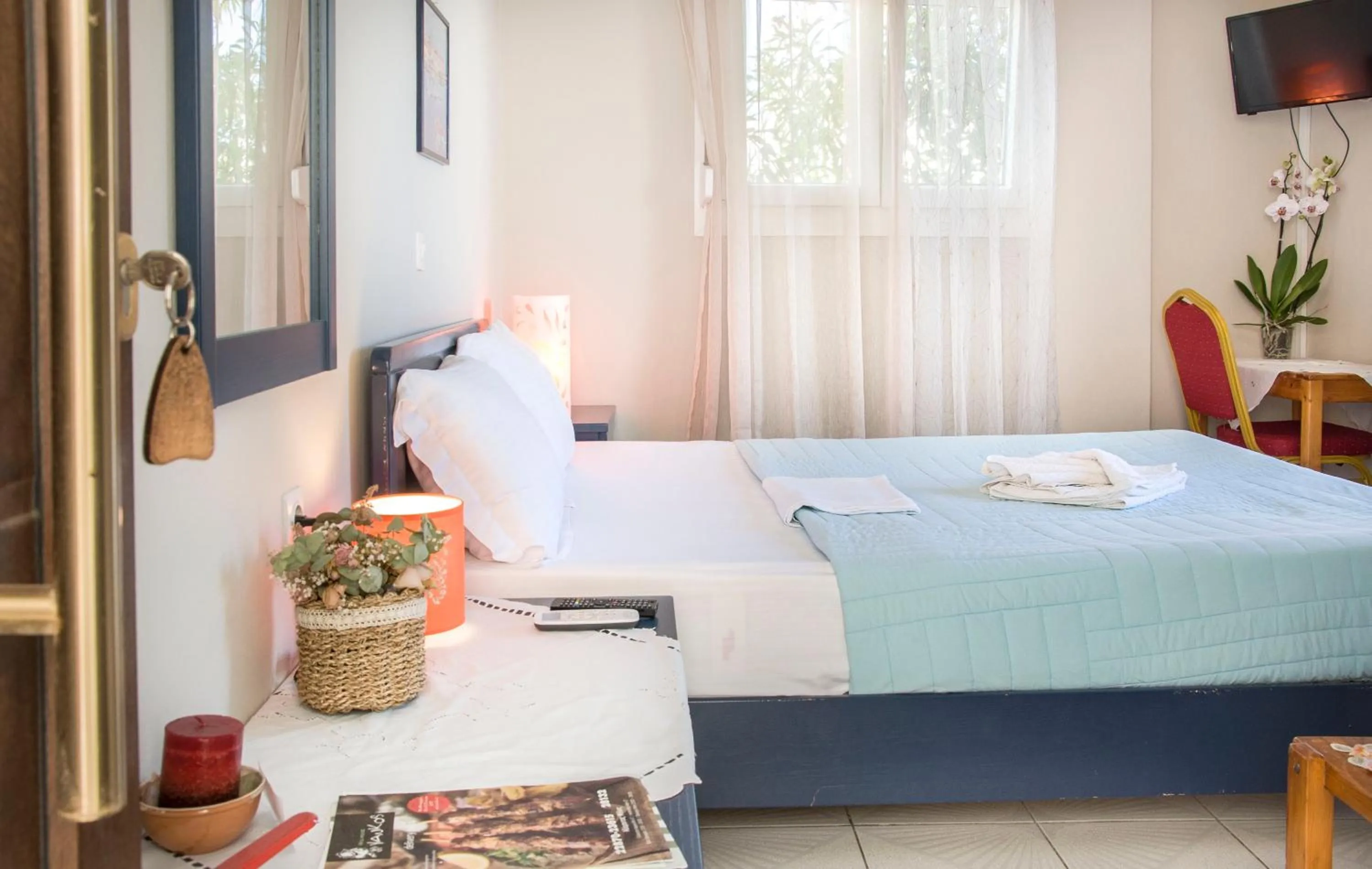 Photo of the whole room, Bed in Christina Rooms