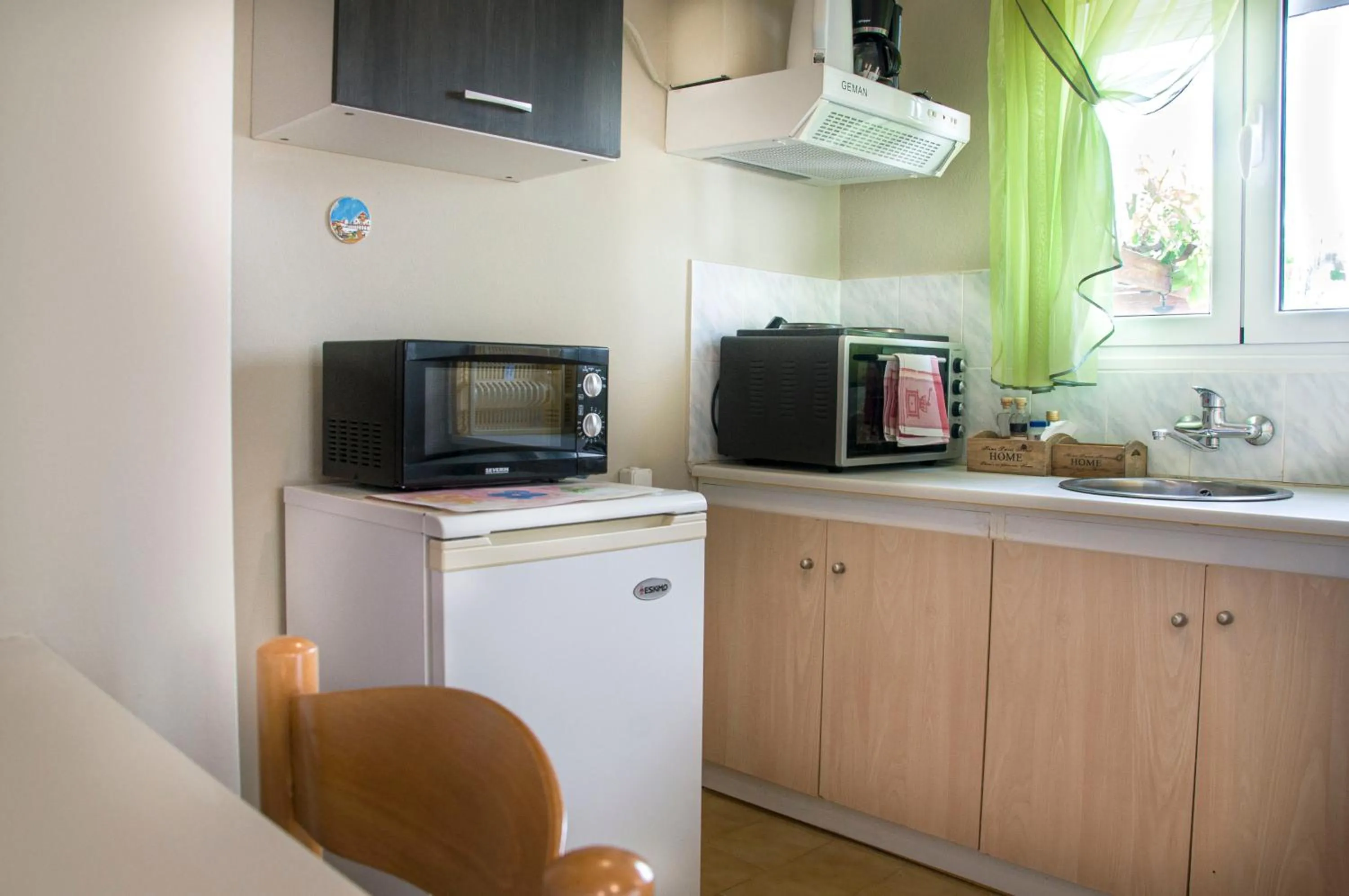 Kitchen or kitchenette in Christina Rooms