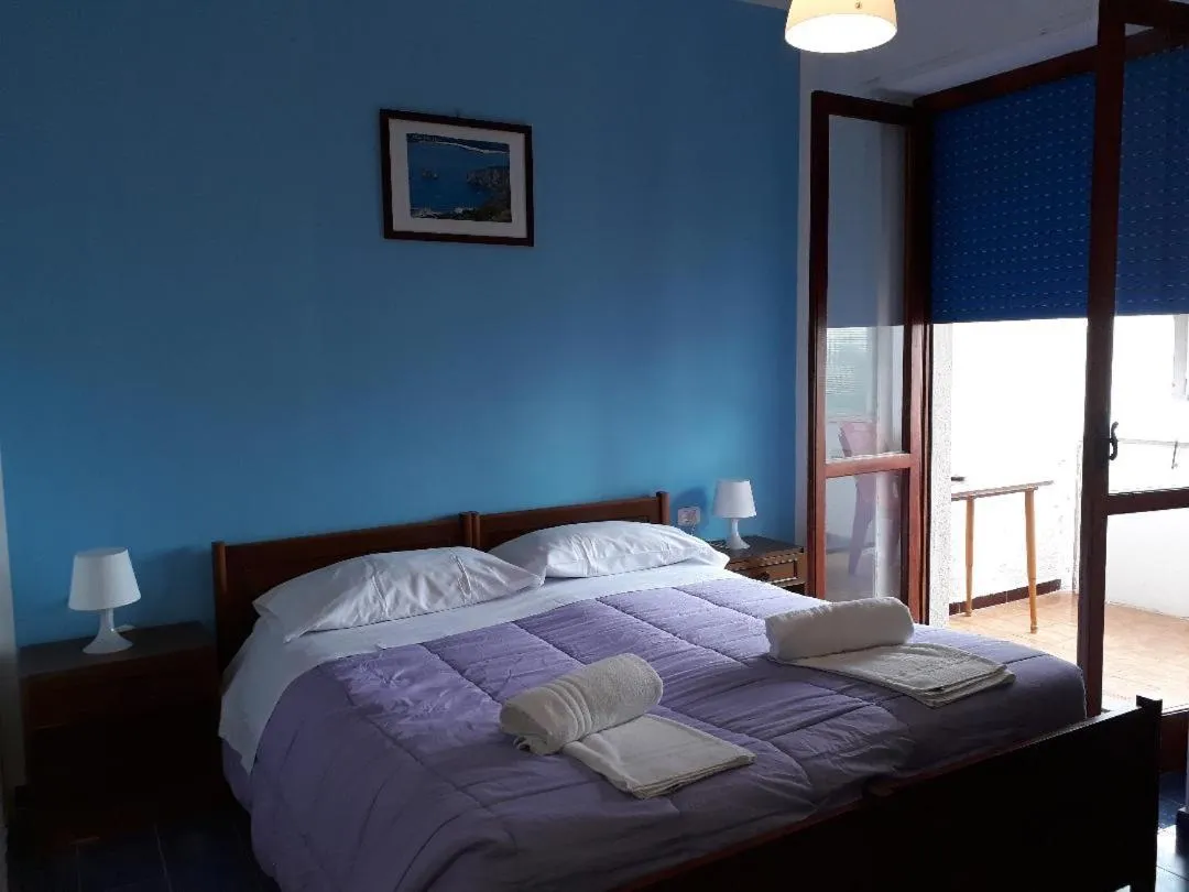 Bed in Pensione Nettuno