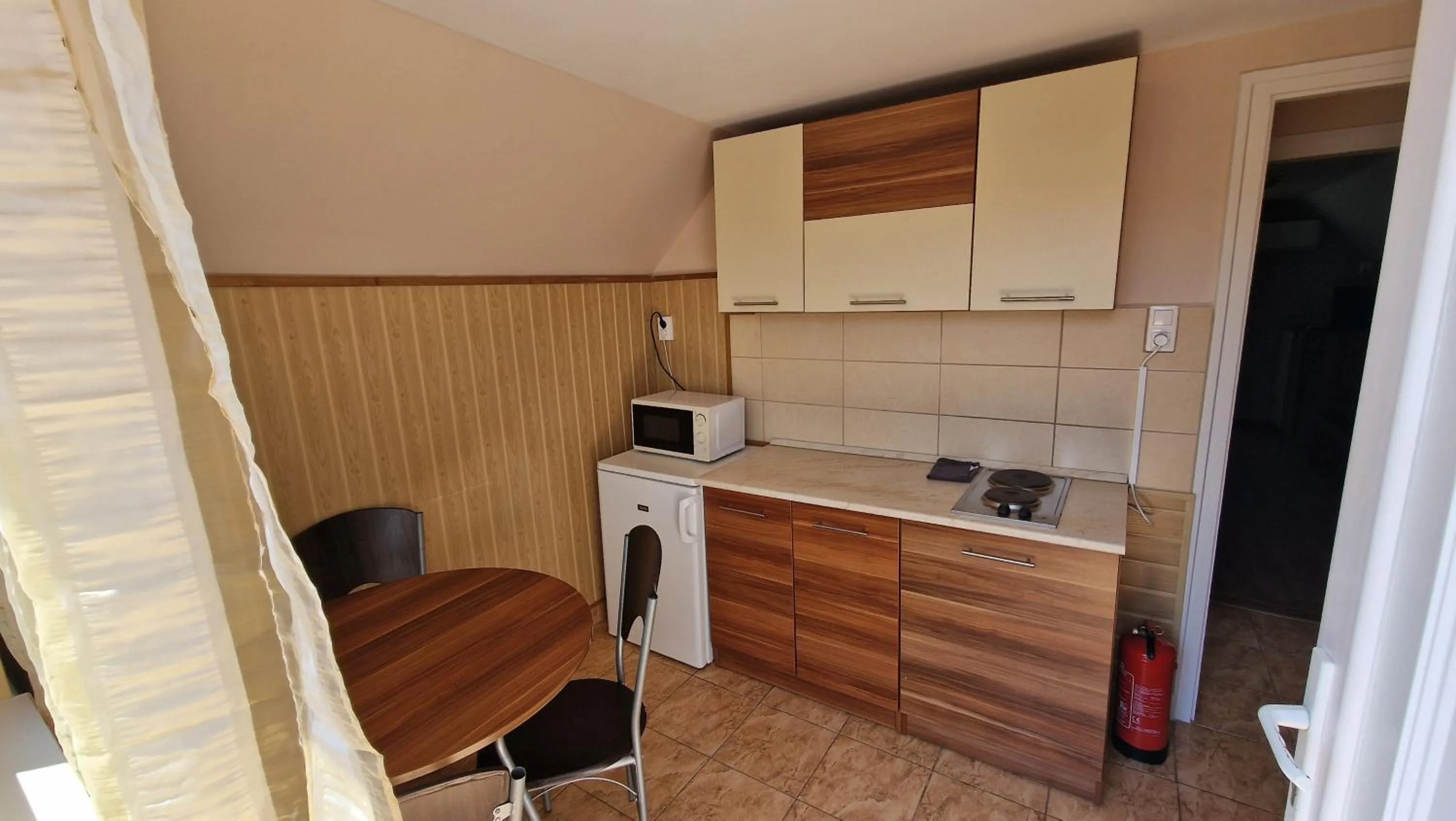 Kitchen or kitchenette in Napsugár Villa "A"