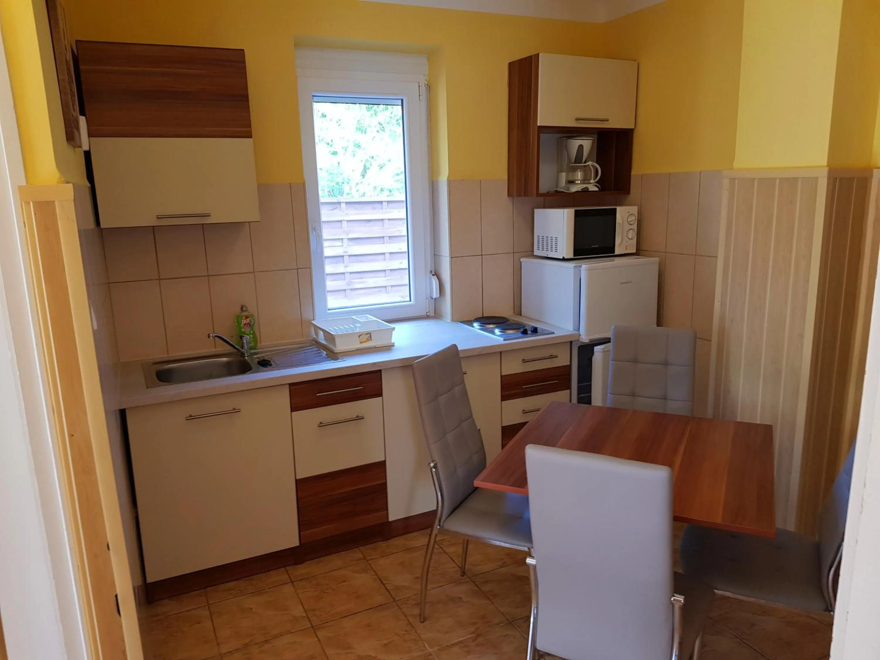 Kitchen or kitchenette in Napsugár Villa "A"