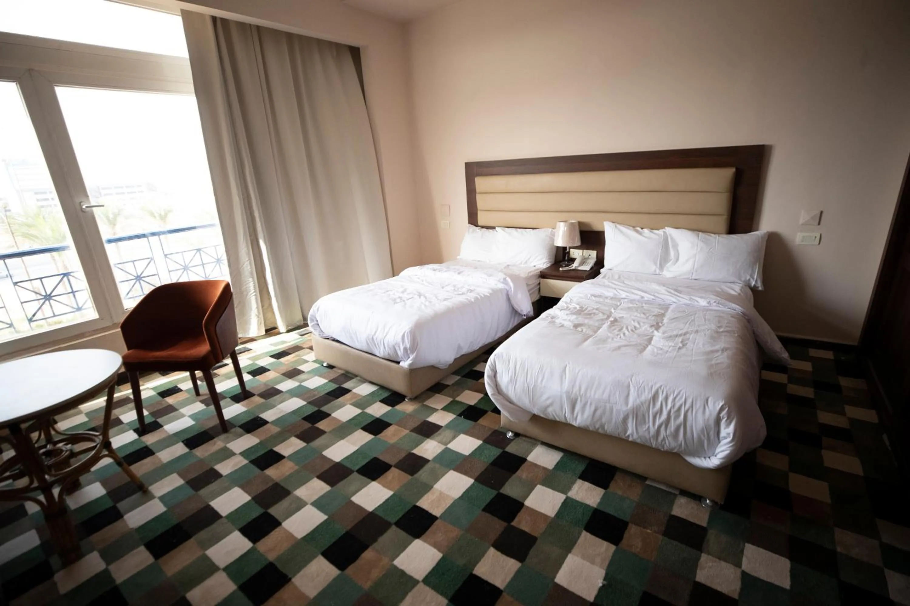 Photo of the whole room, Bed in Oriental grand Plaza