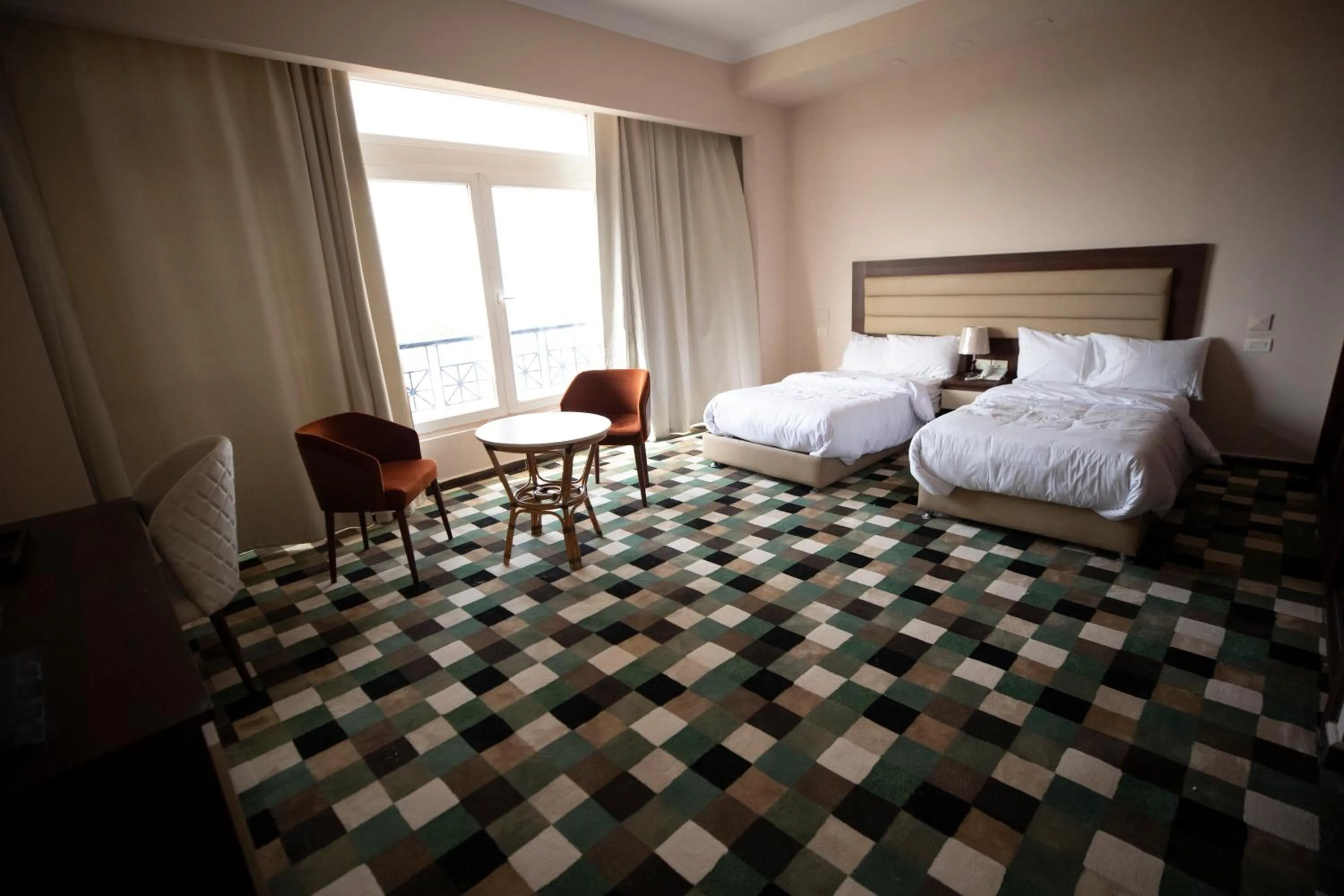 Photo of the whole room, Bed in Oriental grand Plaza