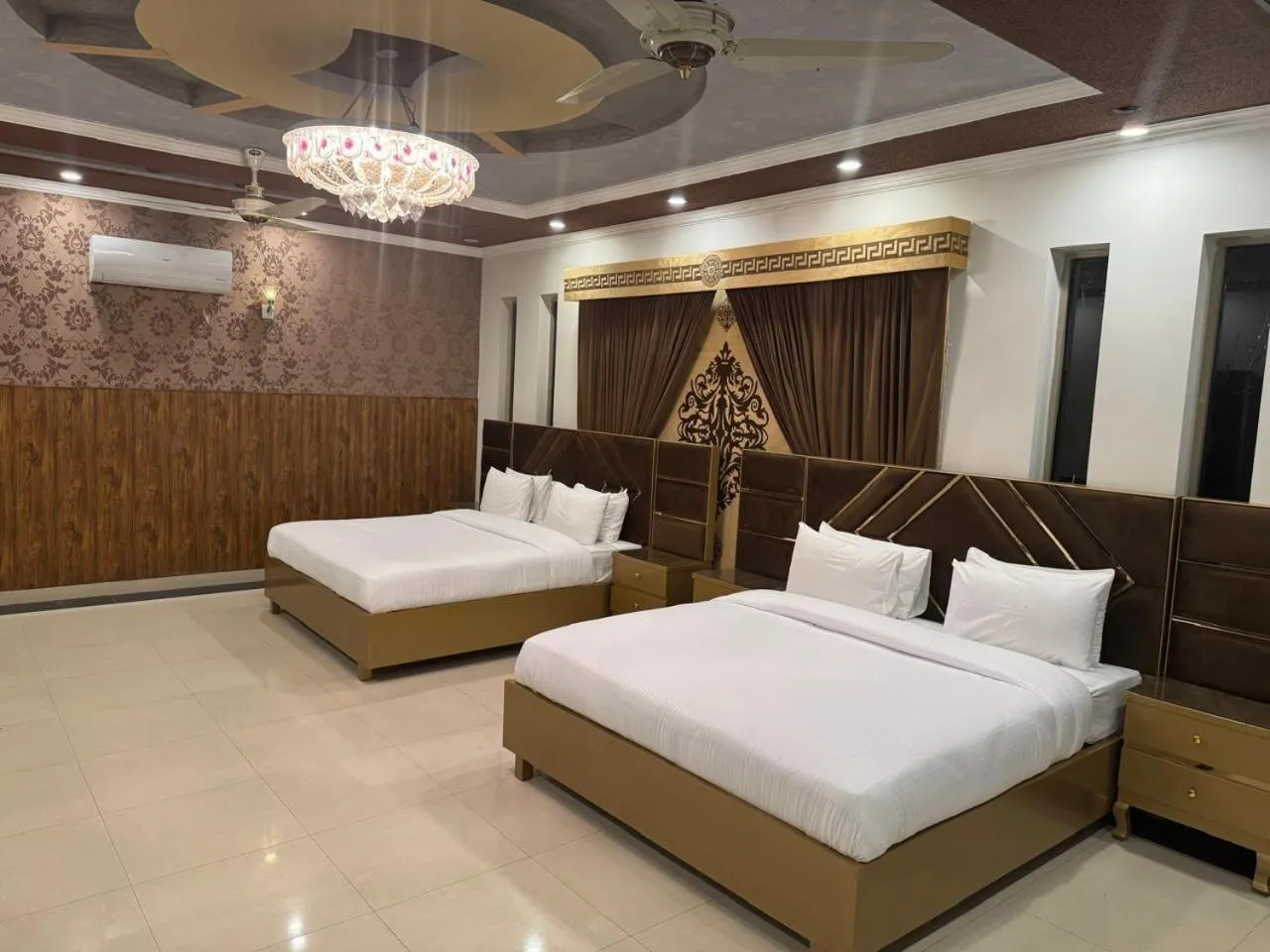 Bed in Travis Executive Guest House Islamabad